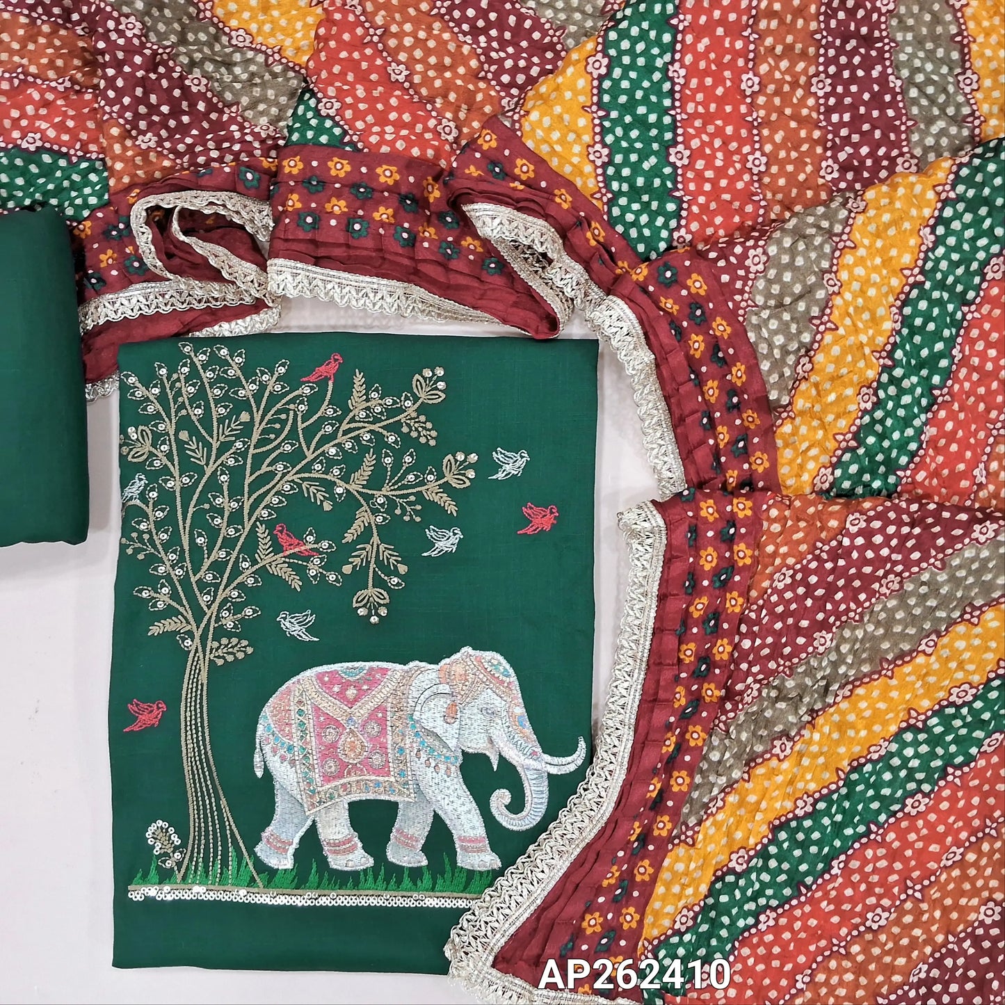 Dark green liquid fabric unstitched salwar material( soft,Lining optional)zari and thread embroidery on yoke, ,matching liquid fabric bottom,multicolor crinkled fancy silk cotton dupatta with lace tapings. AP262410