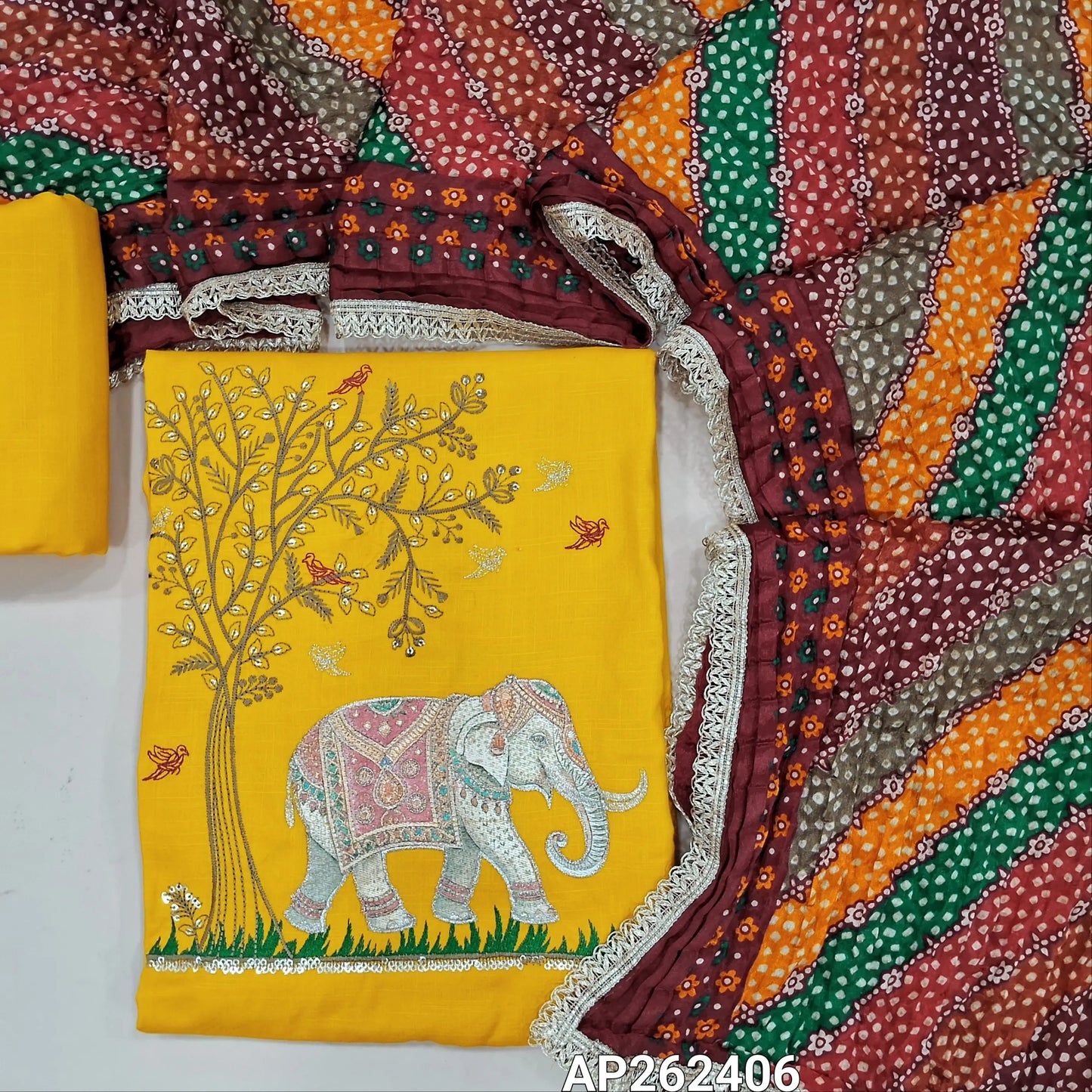 Bright mehandhi yellow liquid fabric unstitched salwar material( soft,Lining optional)zari and thread embroidery on yoke, ,matching liquid fabric bottom,multicolor crinkled fancy silk cotton dupatta with lace tapings. AP262406