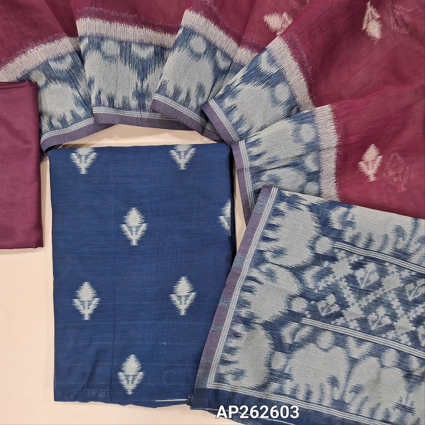 Dark blue ikat fancy silk cotton unstitched salwar material (lining needed) thread weaving on front, dark beetroot purple silky bottom, thread woven and soft fancy silk cotton dupatta . AP262603