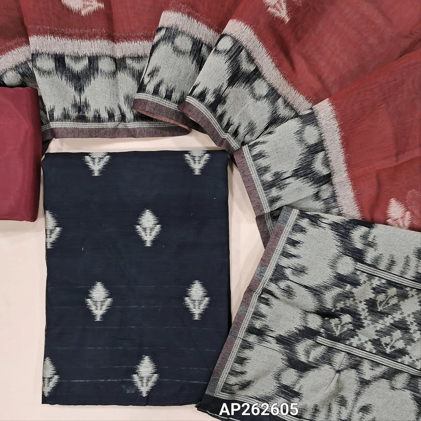 Black ikat fancy silk cotton unstitched salwar material (lining needed) thread weaving on front, maroon silky bottom, thread woven and soft fancy silk cotton dupatta . AP262605
