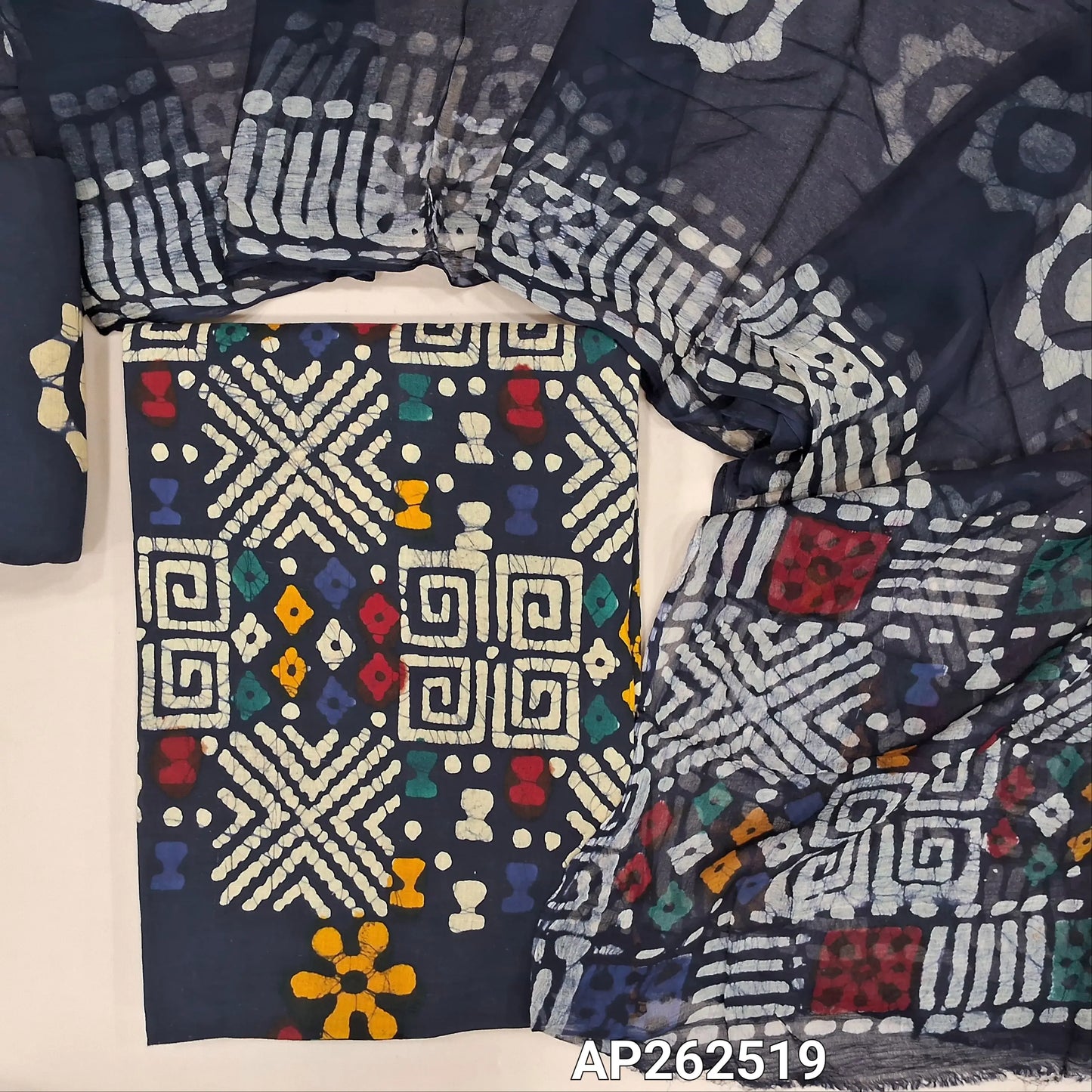 Dark blue multicoloured wax batik dyed pure cotton unstitched salwar material,(lining optional)batik dyed pure cotton bottom, batik design on pure chiffon dupatta (TAPPING NEEDED). AP262519