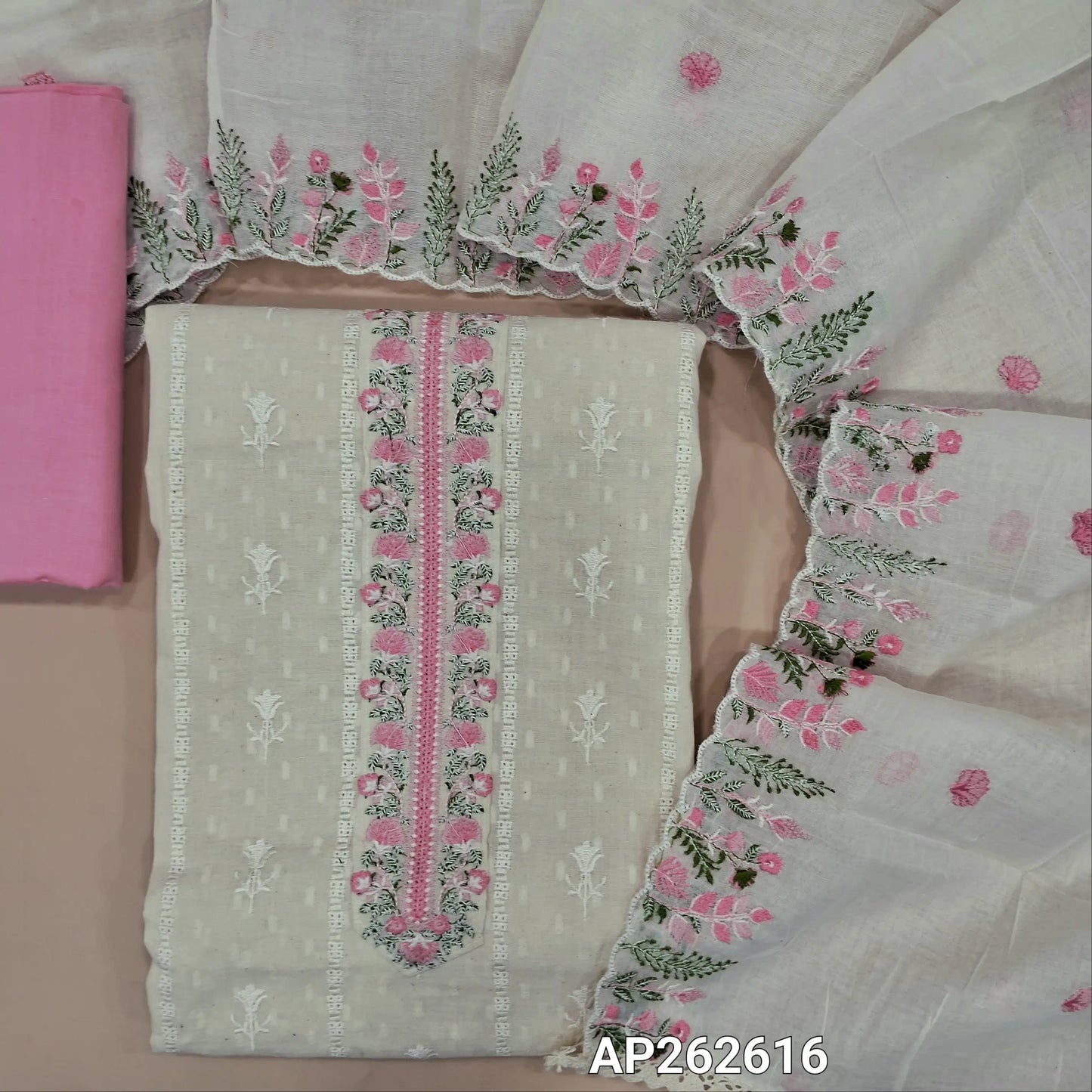 Off white base premium dobby cotton unstitched salwar material,embroidered yoke,self woven and self embroidery design on front  (lining needed)pastel pink cotton bottom,embroidered mul cotton dupatta with scallop borders. AP262616