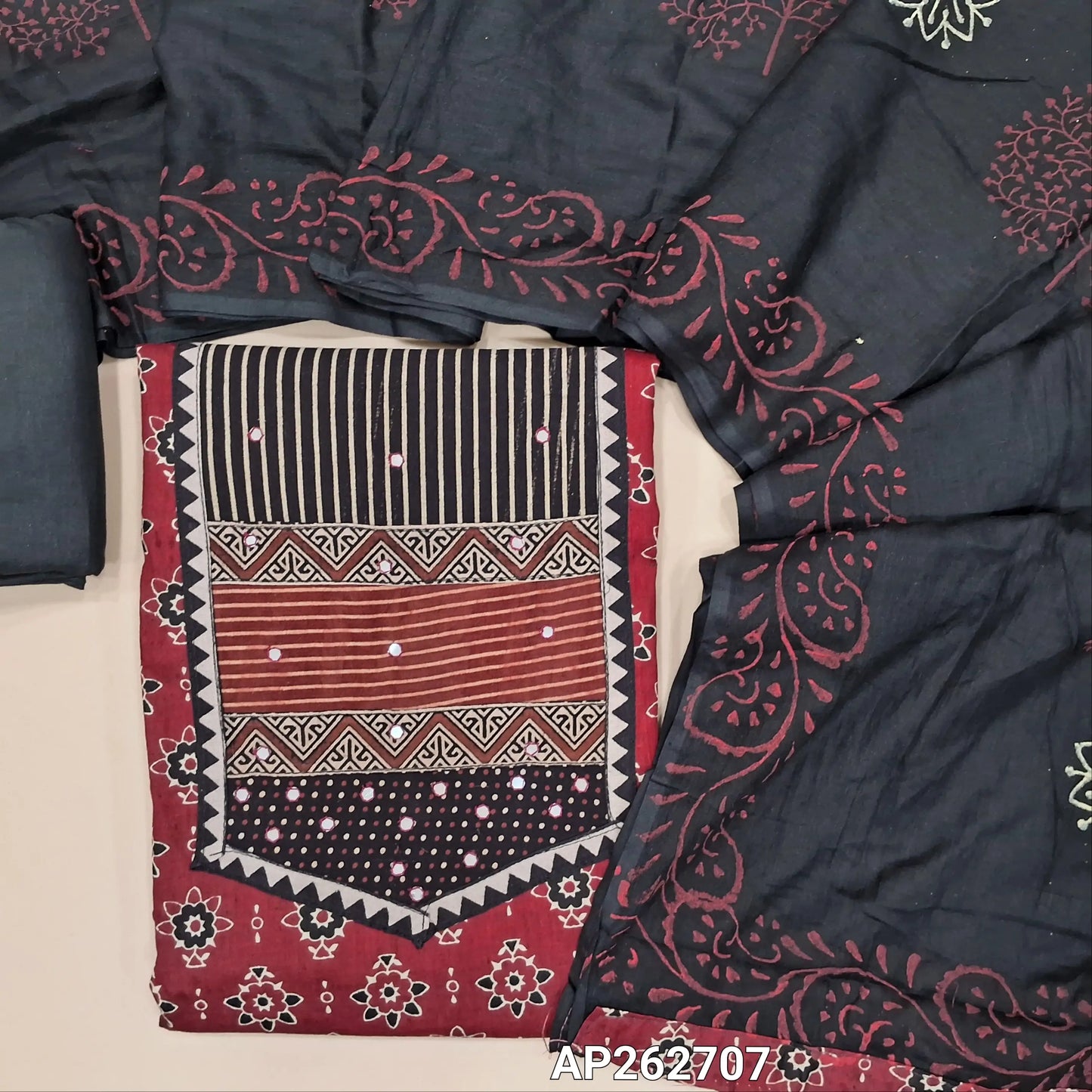 Maroon printed soft cotton unstitched salwar material, yoke patch with faux mirror work (lining needed)black cotton bottom,hand block printed mul cotton dupatta. AP262707