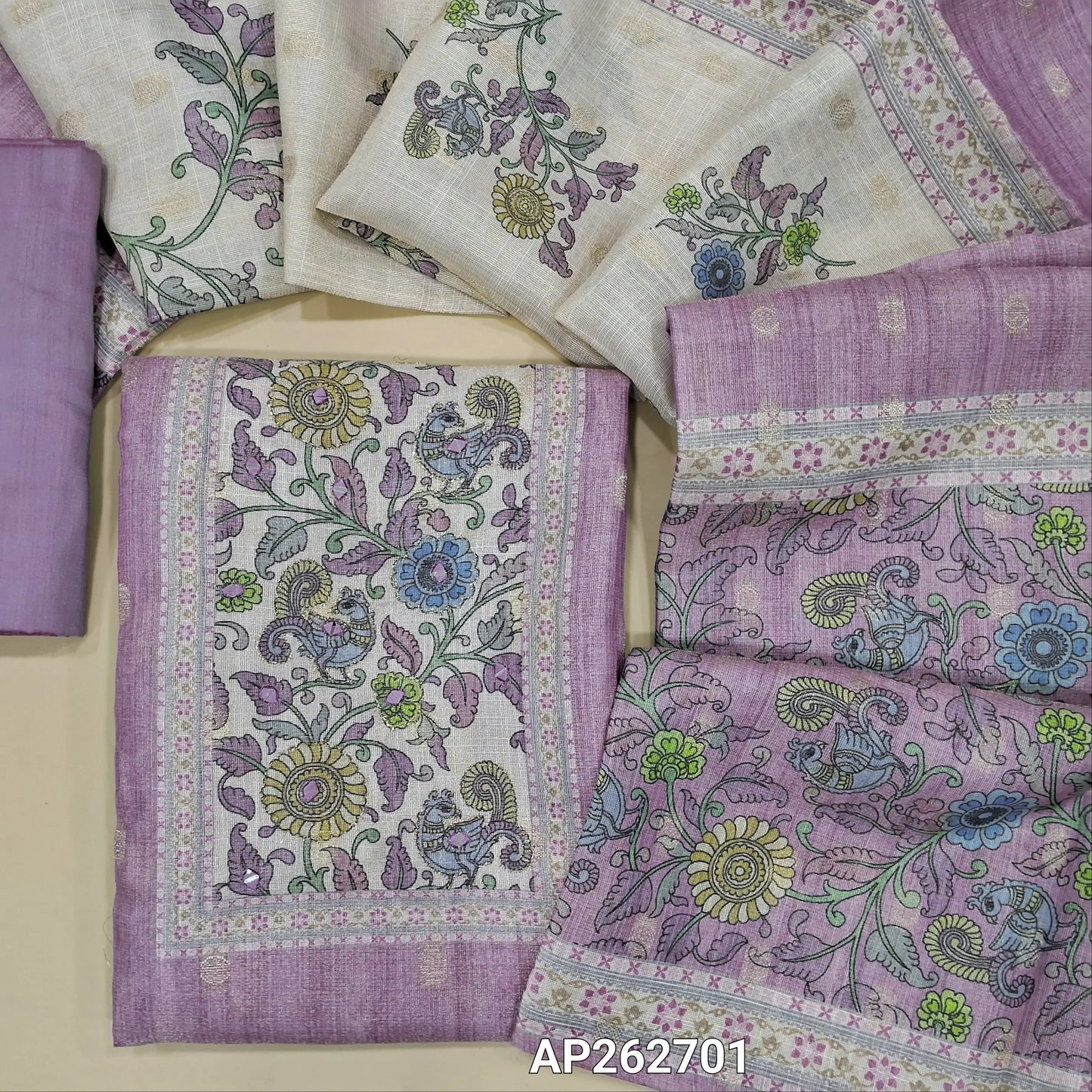 Lavender with golden tint tissue silk cotton unstitched salwar material,kalamkari printed yoke with zari and real mirror work, zari buttas all over,(lining needed)silk cotton bottom,digital printed tissue silk cotton dupatta with kalamkari pallu. AP262701