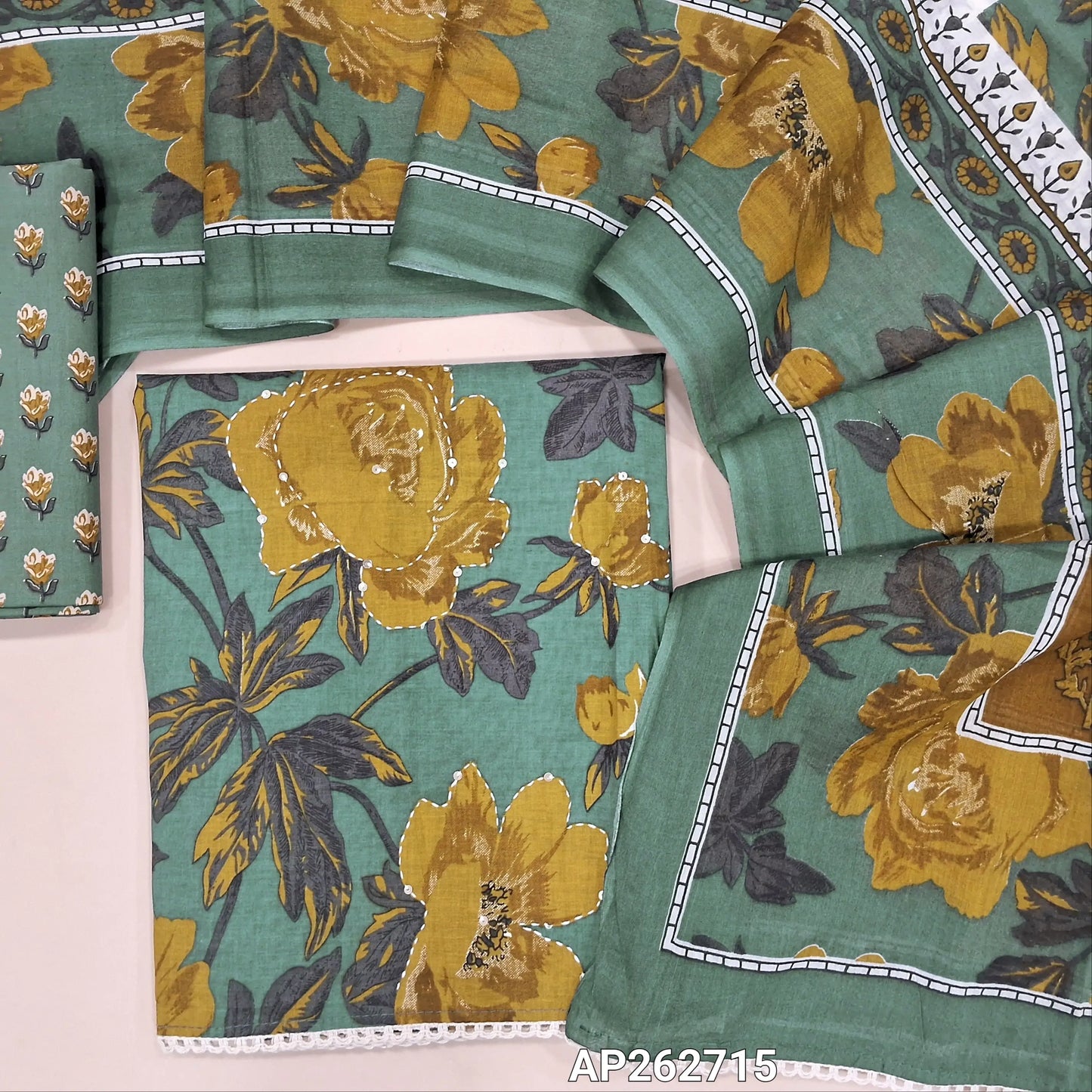 Blueish grey floral printed premium soft cotton unstitched salwar material, kantha stitch and sequins work on front(lining optional)printed cotton bottom,printed cotton bottom,printed mul cotton dupatta with lace tapping. AP262715