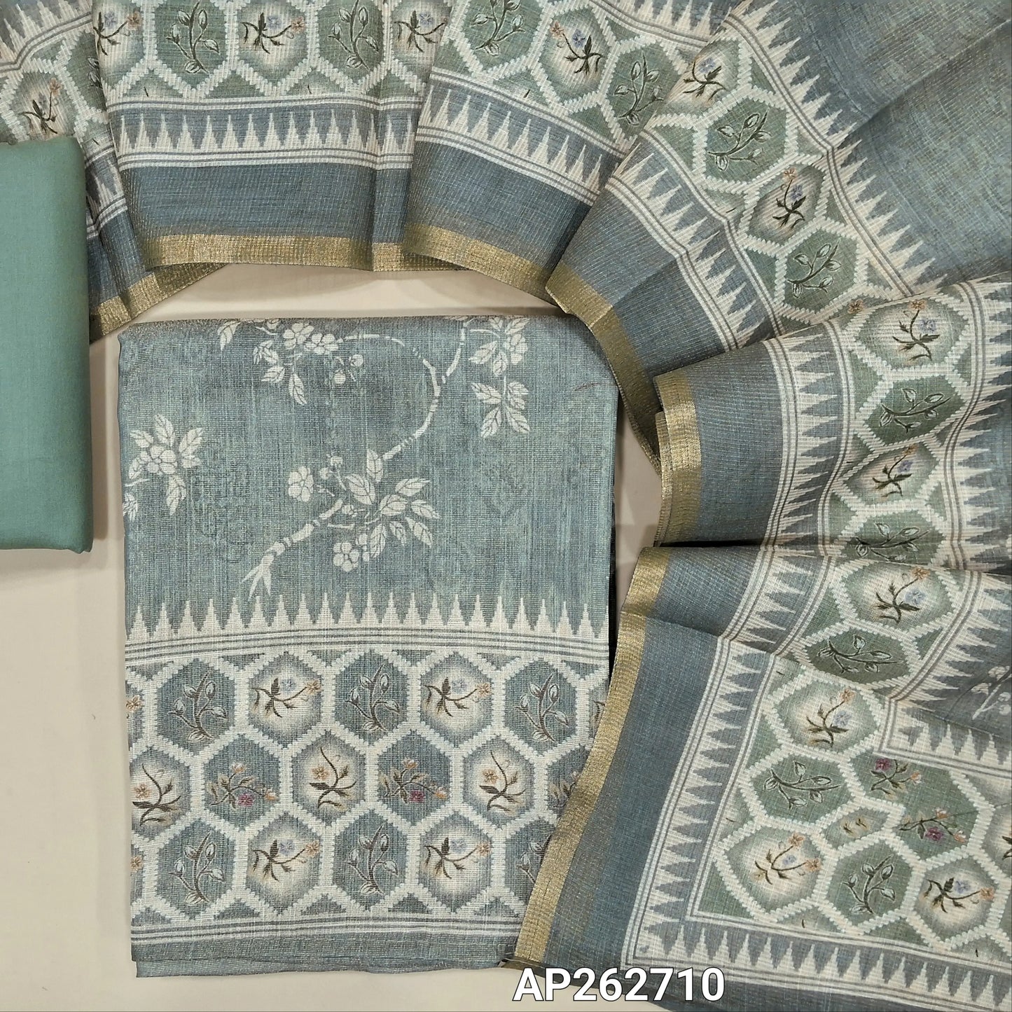 Light green shade digital printed tissue silk cotton with golden tint unstitched salwar material(thin, lining needed) spun cotton bottom,digital printed  tissue silk cotton dupatta with gold tissue borders. AP262710