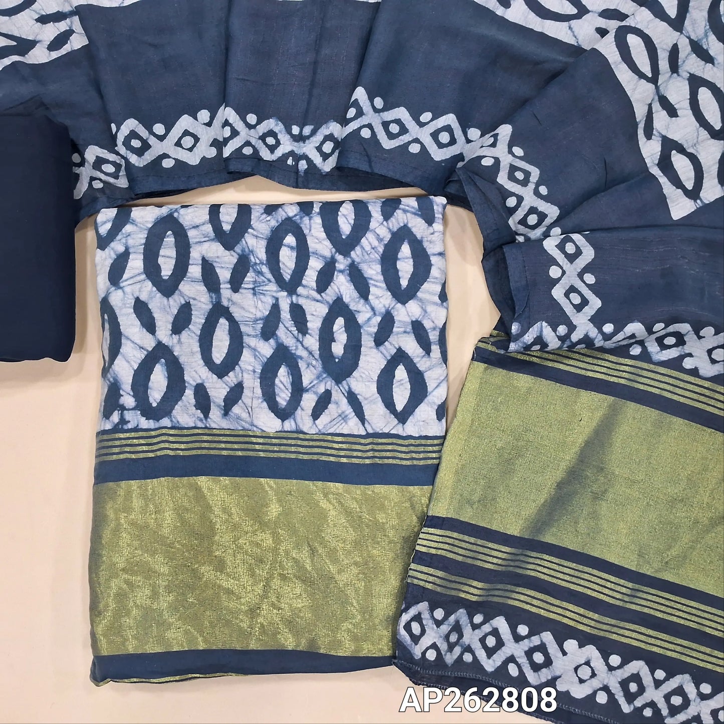 Teal blue original wax batik dyed soft modal silk cotton unstitched salwar material(lining needed)golden tissue on daman,santoom bottom,wax batik dyed soft modal silk cotton dupatta with gold tissue borders.AP262808