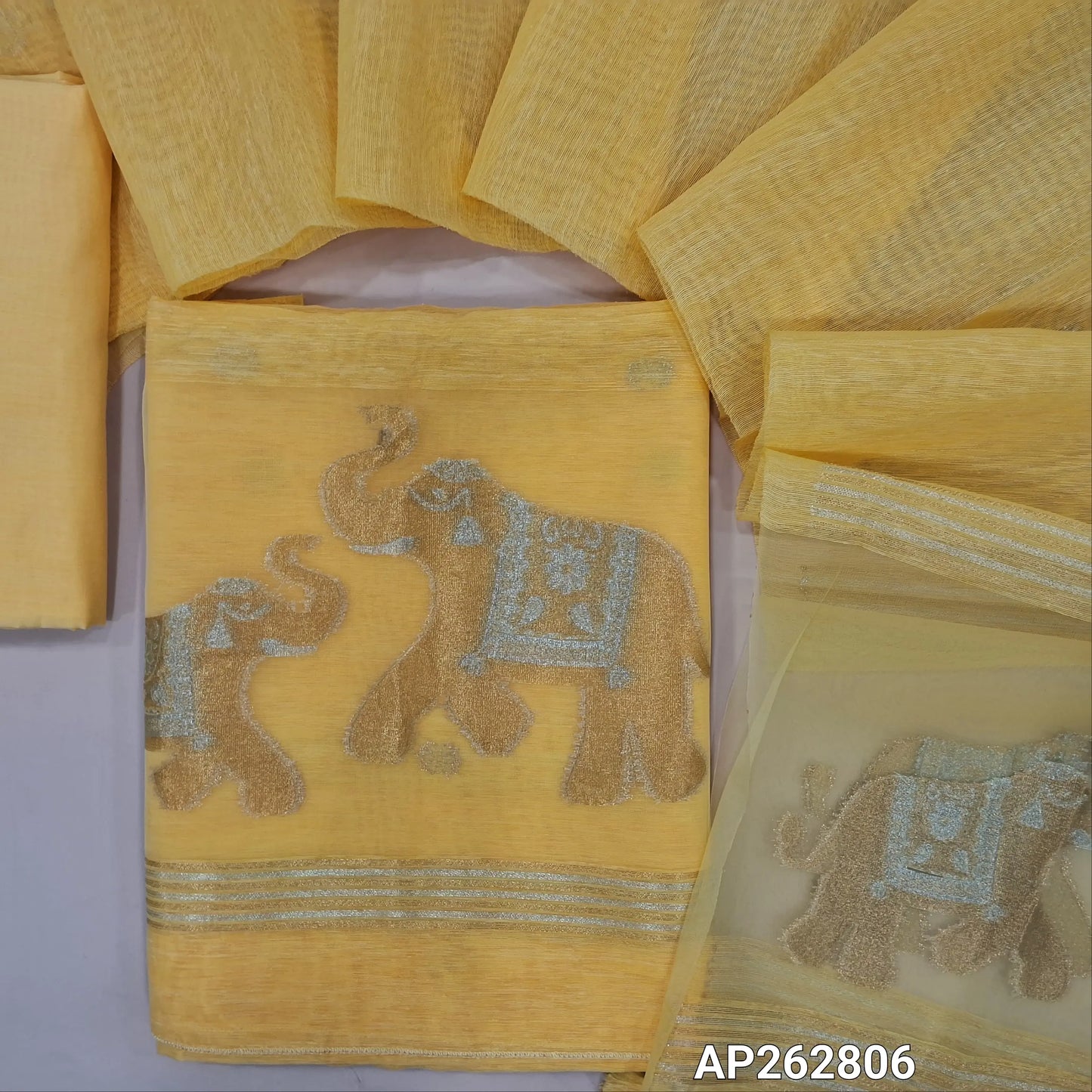 Designer pastel yellow jamdani woven premium tussar unstitched salwar material, (thin,lining needed)gold and silver zari weaving on organza daman, silk cotton bottom, jamdani woven on tussar silk dupatta with tassels with organza pallu. AP262806