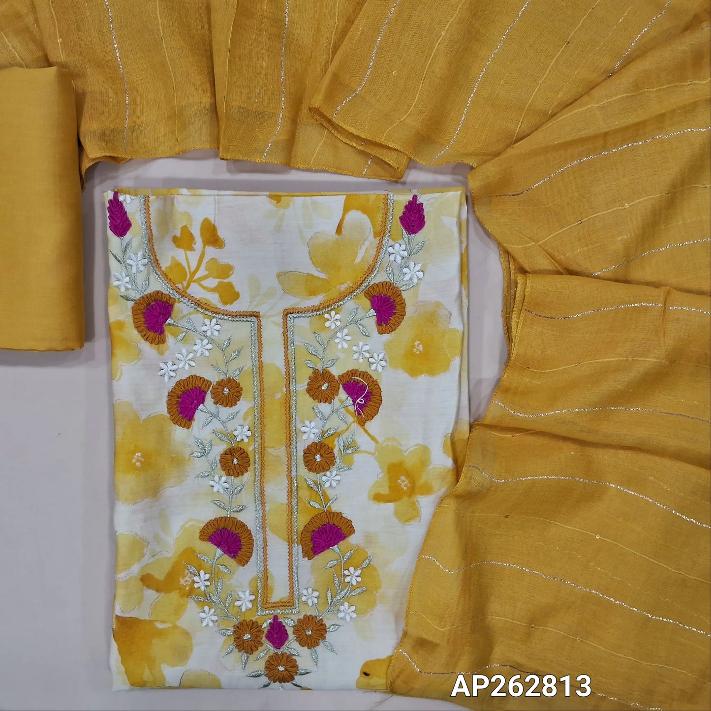 Pastel yellow floral printed modal maslin silk unstitched salwar material, thread & zari work on yoke(soft,lining optional)matching silky bottom, zari & sequins work on fancy soft silk cotton dupatta. AP262813