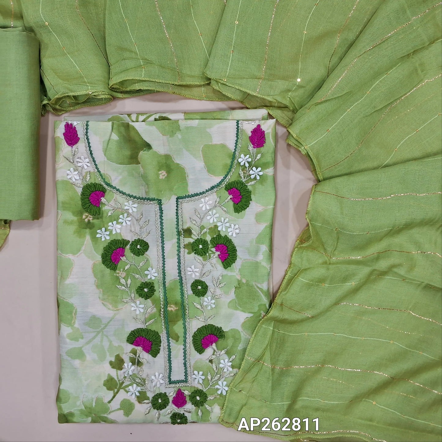 Pastel green floral printed modal maslin silk unstitched salwar material, thread & zari work on yoke(soft,lining optional)matching silky bottom, zari & sequins work on fancy soft silk cotton dupatta. AP262811