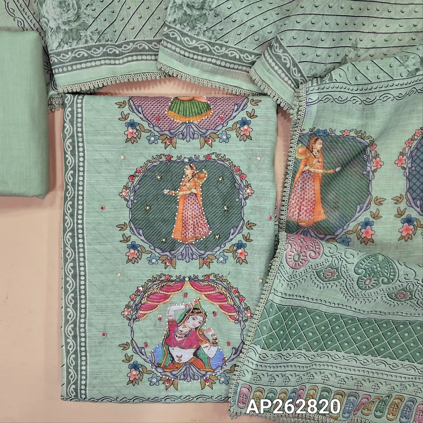 Digital Printed pale green premium linen salwar material (lining needed)panel design, sugar bead, &zardosi work on front, sugar bead ,cut bead on daman, matching cotton bottom,digital printed permium linen dupatta with lace taping. AP262820