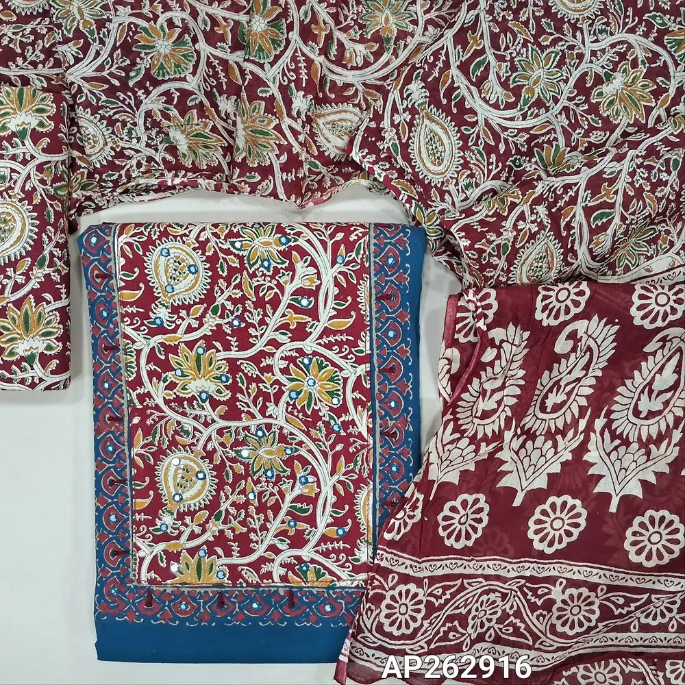 Blue pure cotton unstitched salwar material,hand block and kalamkari printed yoke with faux mirror work(lining optional)reddish maroon kalamkari printed cotton bottom,floral printed mul cotton dupatta with pallu. AP262916