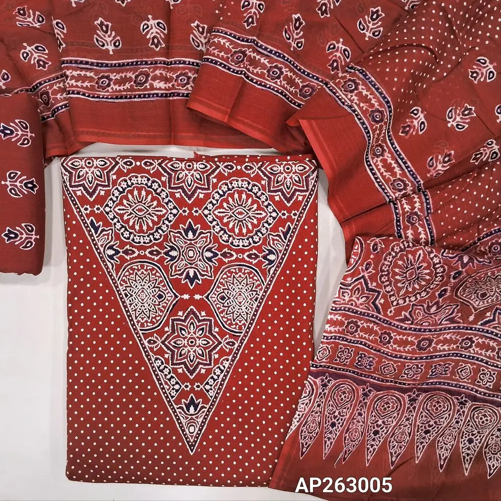 Red pure soft cotton unstitched salwar material(lining optional)ajrak printed work with v neck on yoke, pulka dots all over,ajrak daman borders, printed cotton bottom, printed full length mul cotton dupatta with ajrak border on pallu. AP263005