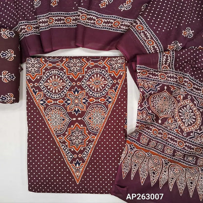 Dark maroon pure soft cotton unstitched salwar material(lining optional)ajrak printed work with v neck on yoke, pulka dots all over,ajrak daman borders, printed cotton bottom, printed full length mul cotton dupatta with ajrak border on pallu. AP263007