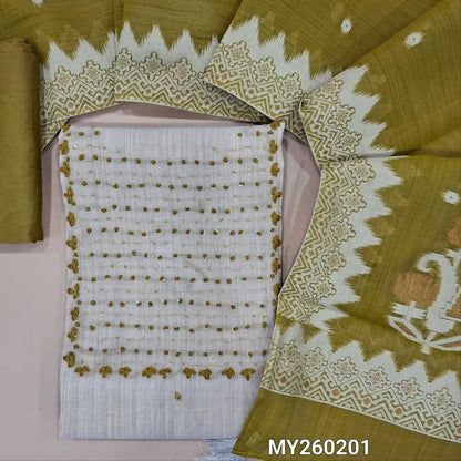 Light beige silk cotton unstitched salwar material, french knot and cut bead work on yoke,faux mirror work on front,(lining needed)mehandhi green silky bottom,soft silk cotton dupatta with thread and gold zari weaving on pallu and borders. MY260201