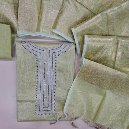 Pastel green with golden tint soft tissue silk cotton unstitched salwar material, zari& sequins work on yoke(thin fabric, lining needed)matching santoon bottom, banarasi zari woven tissue silk cotton dupatta with tassels. CODE OC242316