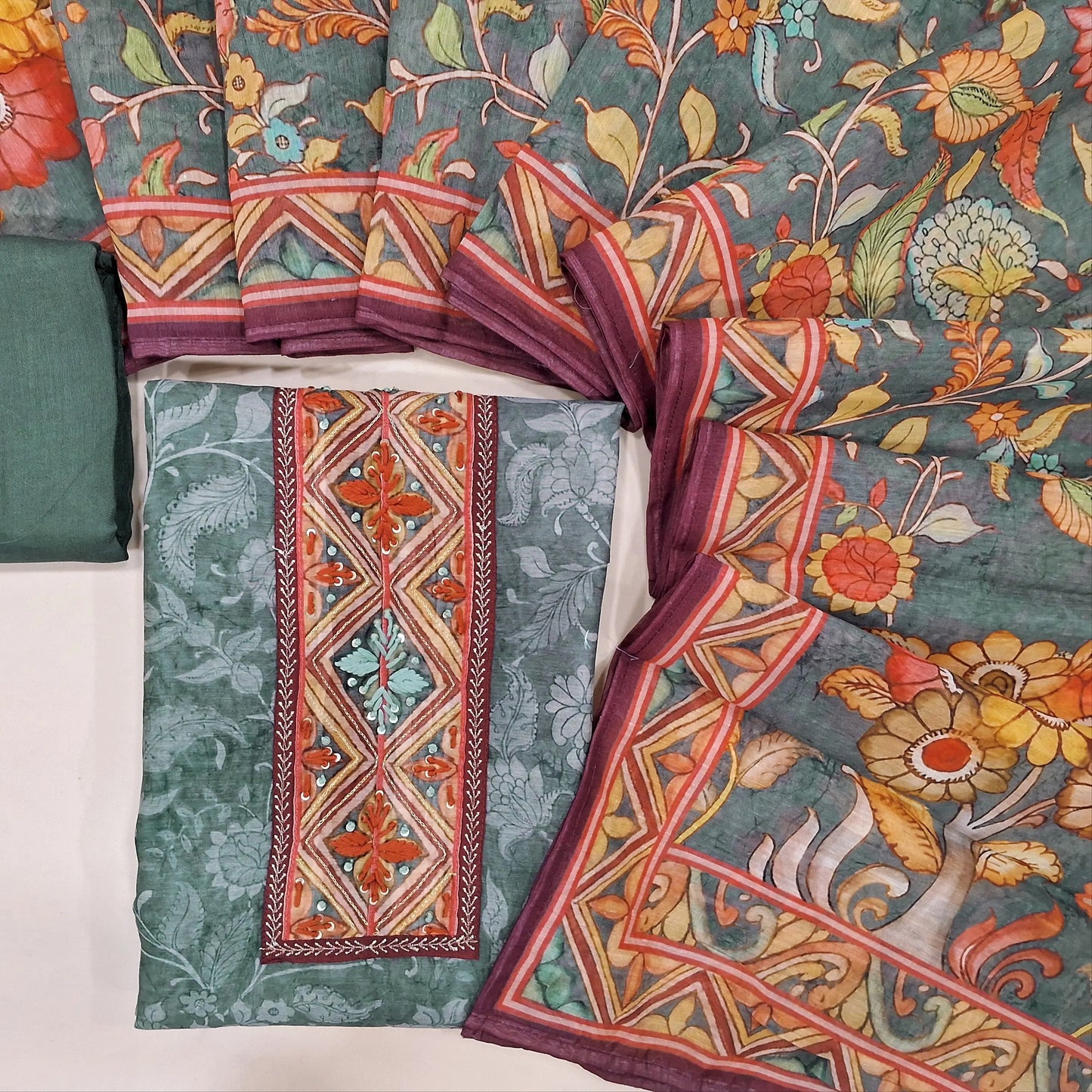Dark grey digital floral printed silk cotton unstitched salwar material, hand embroidered on yoke(thin fabric, lining needed)matching santoon bottom, digital printed silk cotton dupatta. CODE OC241612