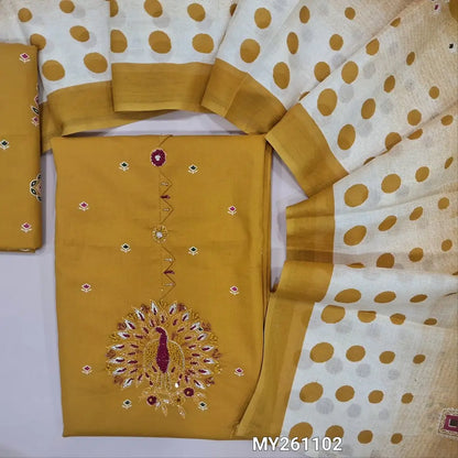 Fenugreek yellow pure cotton unstitched salwar material,floral printed all over,embroidery with zarodsi and thread detailing (lining needed)printed cotton bottom,printed full length mul cotton dupatta. MY261102