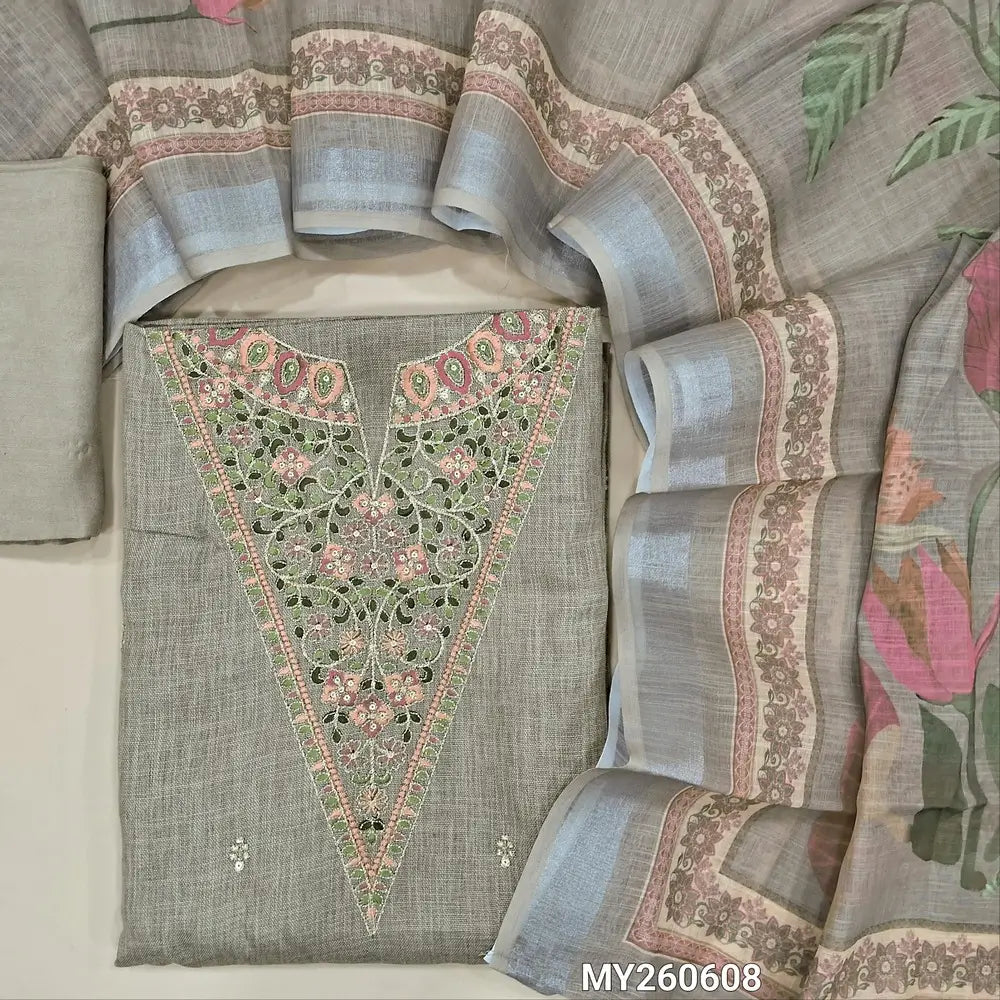 Greyish beige semi linen unstitched salwar material,thread embroidery & zari detaling on yoke,floral embroidery on front ( lining optional)matching santoom bottom,digital printed semi linen dupatta.MY260608