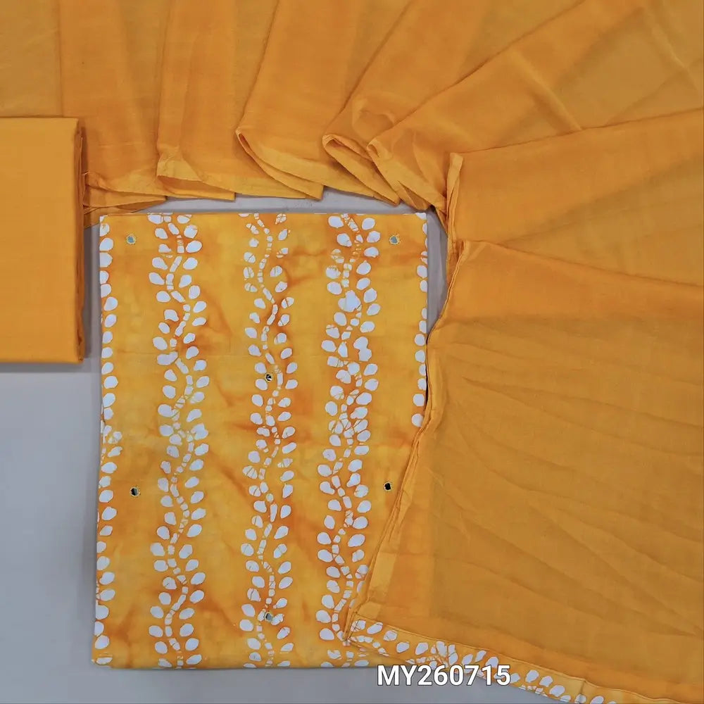Bright mango yellow wax batik dyed soft cotton unstitched salwar material( lining optional)faux mirror work all over,matching cotton fabric provided for lining , NO BOTTOM,fancy chiffon dupatta. MY260715