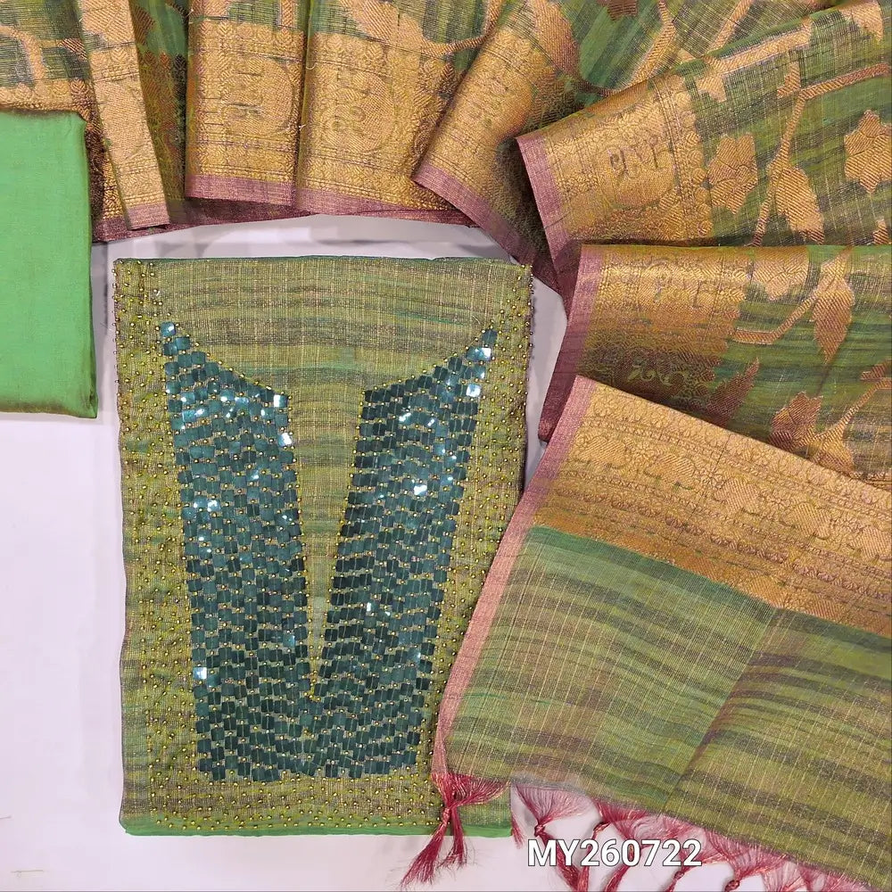 Green with golden tint tissue silk cotton unstitched salwar material, bead& sequins work on yoke(thin, lining needed)matching silk cotton bottom, soft tissue silk cotton dupatta with copper zari woven design( DESIGN MIGHT VARY).MY260722