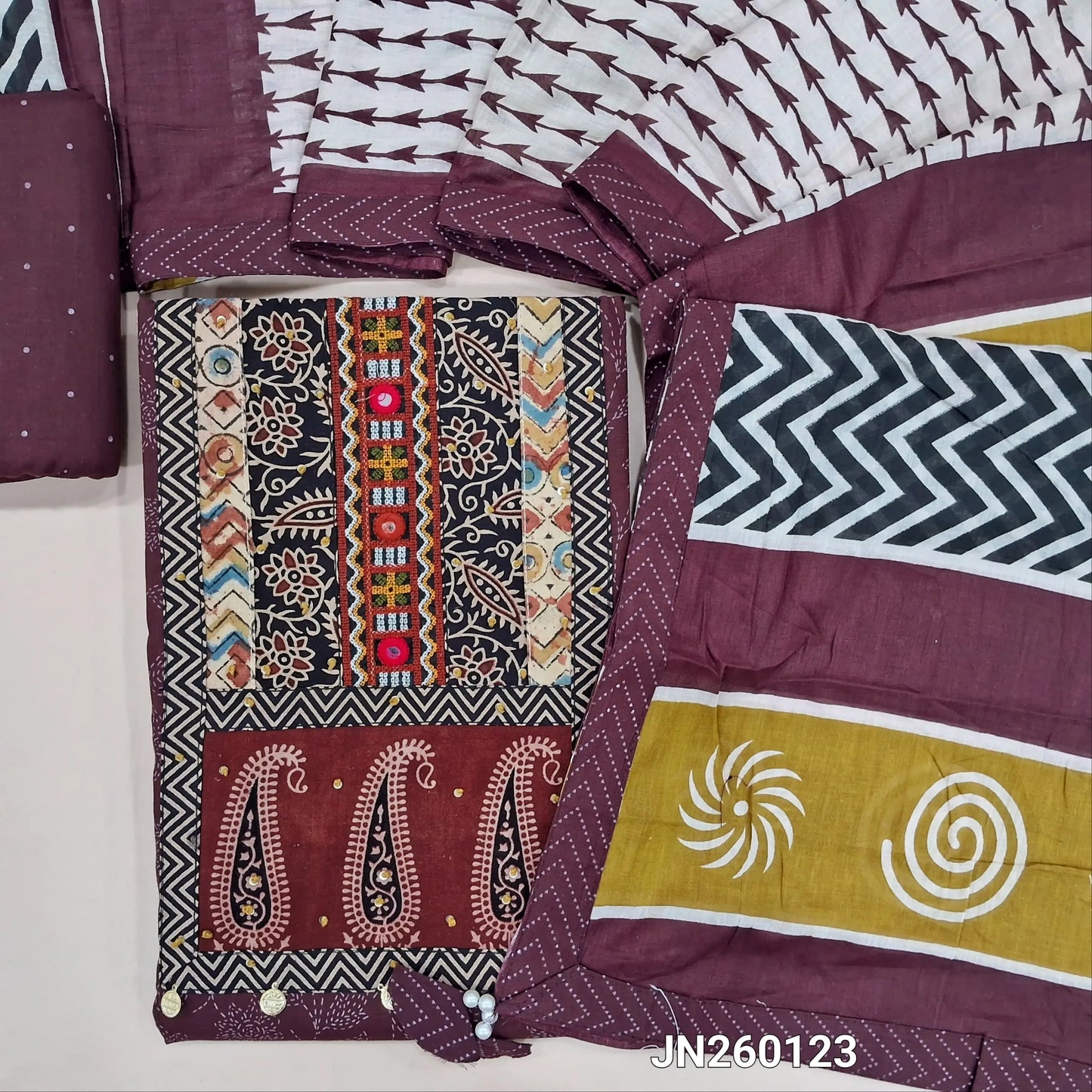 Wine purple printed pure cotton unstitched salwar material, ajrak yoke patch with hand embroidery work(lining optional)printed cotton bottom,printed soft mul cotton dupatta. JN260123
