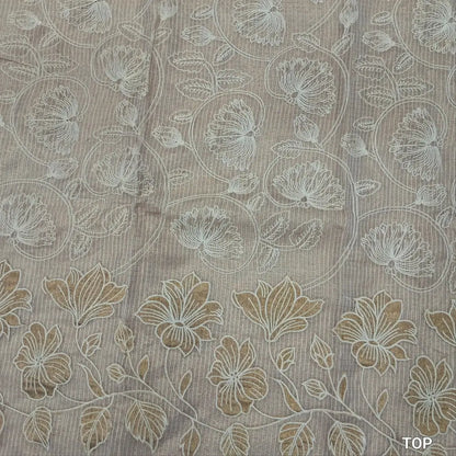 Rich golden beige tissue kota unstitched salwar material (lining needed) thread embroidery and applique work on daman, self embroidered,matching spun cotton bottom, rich embroidery work on tissue kota dupatta with benarasi zari woven borders. MY262124
