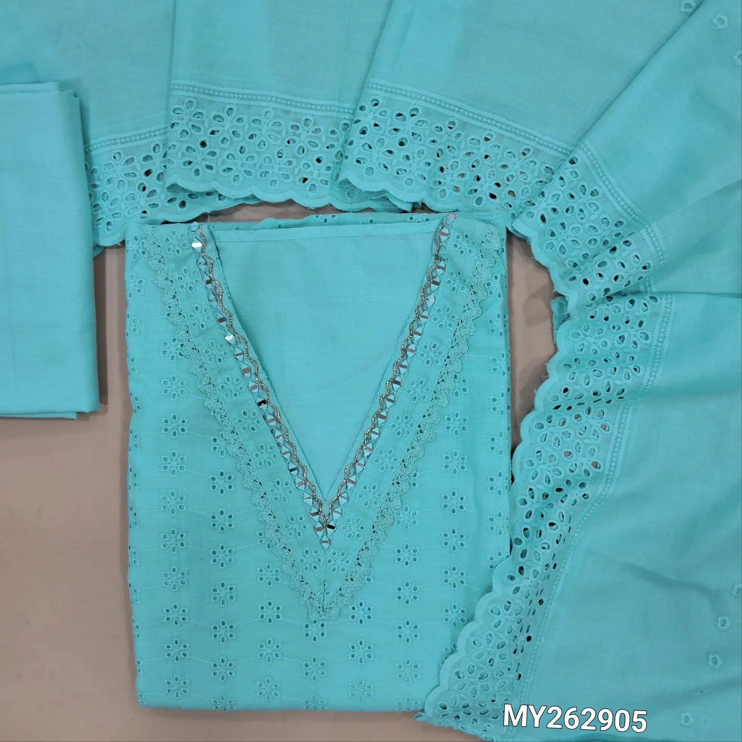 Pastel blue schiffli embroidered soft glazed cotton unstitched salwar material(lining needed) lace detailing & real mirror work on yoke,embroidery allover, cotton bottom, schiffli embroidered & cut work, mul cotton dupatta with scallop borders. MY262905