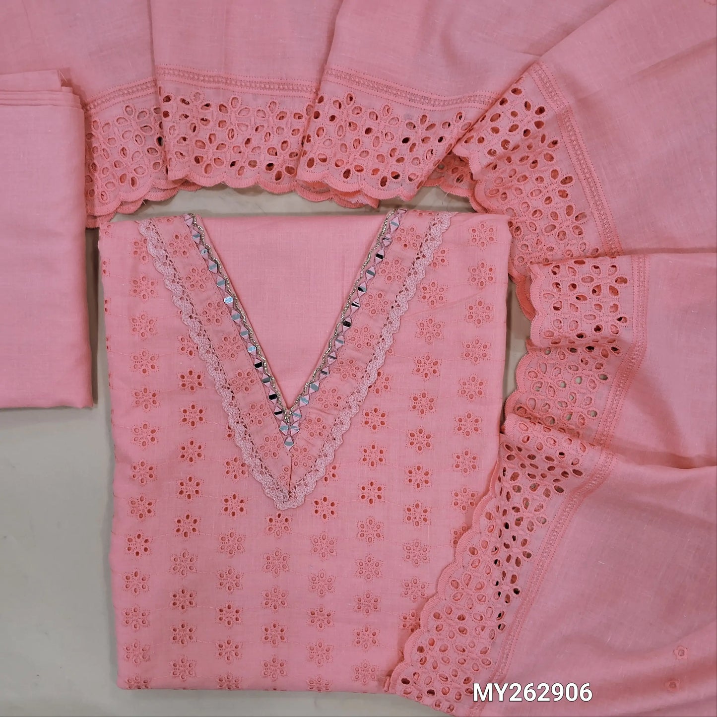 Pastel pink schiffli embroidered soft glazed cotton unstitched salwar material(lining needed) lace detailing & real mirror work on yoke,embroidery allover, cotton bottom, schiffli embroidered & cut work, mul cotton dupatta with scallop borders. MY262906