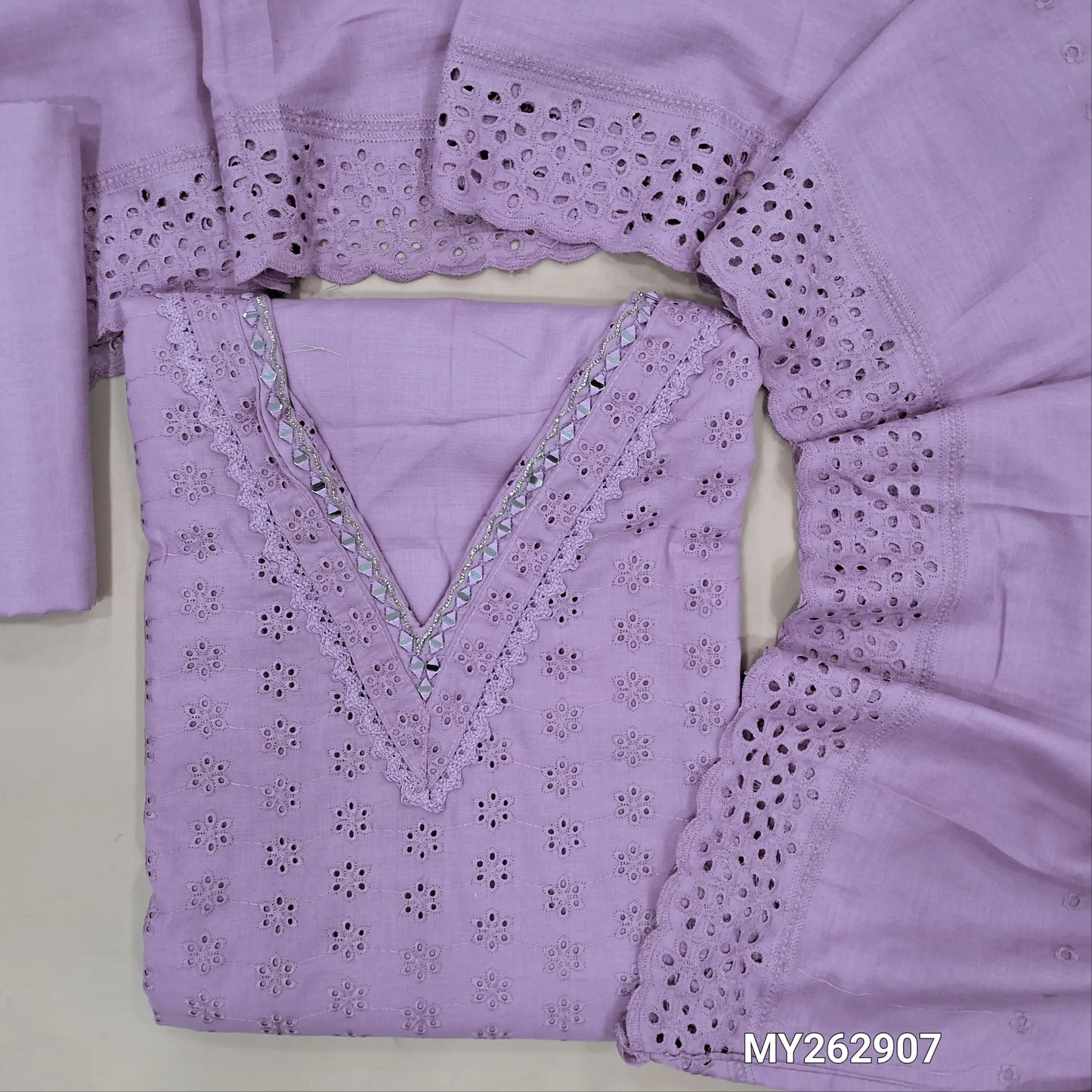 Lavender schiffli embroidered soft glazed cotton unstitched salwar material(lining needed) lace detailing & real mirror work on yoke,embroidery allover, cotton bottom, schiffli embroidered & cut work, mul cotton dupatta with scallop borders. MY262907