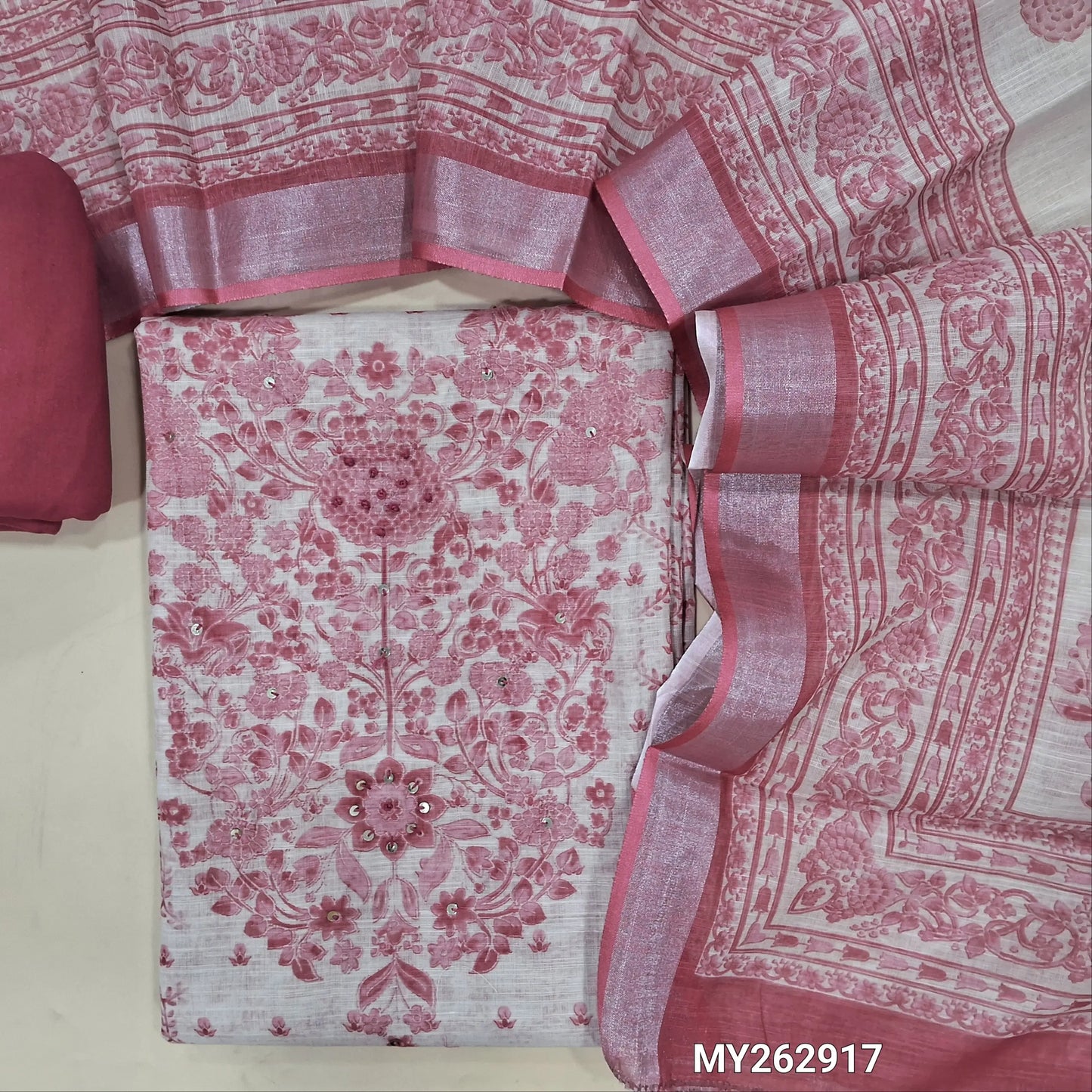 Beige base premium semi linen salwar material , french knot, sequins work on yoke,digital printed and panel design,(textured, lining needed)pink spun cotton bottom,digital printed semi linen dupatta with silver tissue borders. MY262917