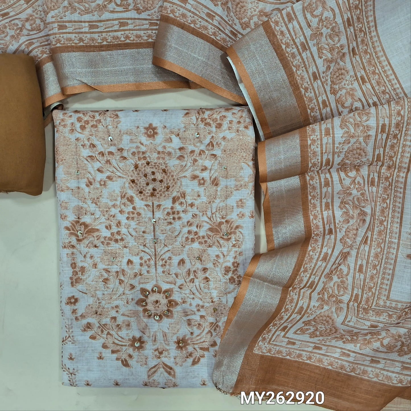 Beige base premium semi linen salwar material , french knot, sequins work on yoke,digital printed and panel design,(textured, lining needed)sand brown spun cotton bottom,digital printed semi linen dupatta with silver tissue borders. MY262920