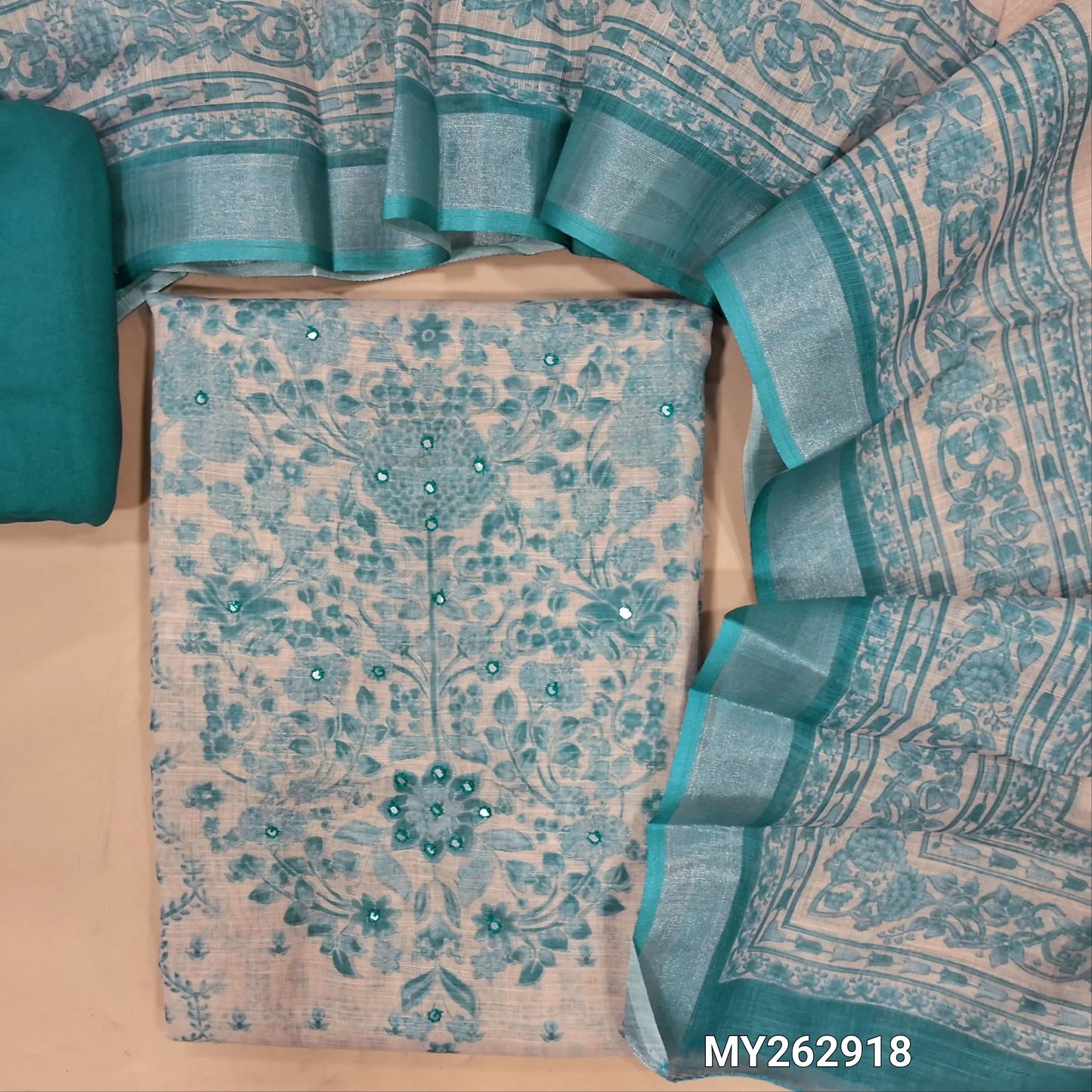 Beige base premium semi linen salwar material , french knot, sequins work on yoke,digital printed and panel design,(textured, lining needed)blue spun cotton bottom,digital printed semi linen dupatta with silver tissue borders. MY262918