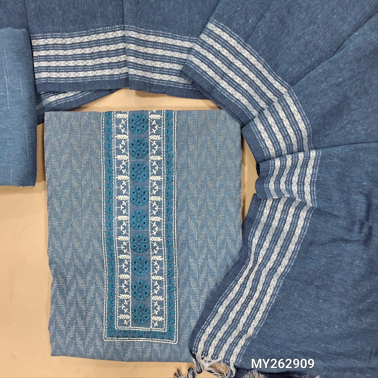Denim blue spun silk cotton unstitched salwar material,embroidery work on yoke, self woven design all over(lining optional)matching spun silk cotton bottom, spun silk cotton short width dupatta with thread woven borders. MY262909