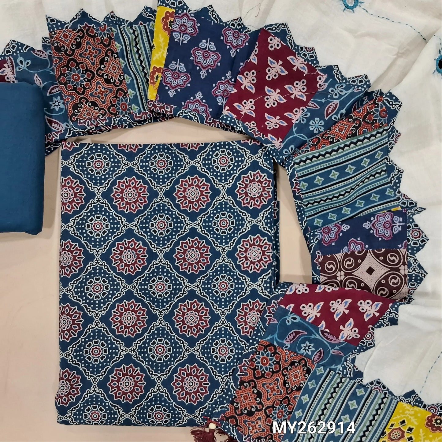 Teal blue ajrak hand block printed pure cotton unstitched salwar material(lining optional) cotton bottom, designer hand made with real mirror, kantha stitch & applique work dupatta with ajrak borders on tassles. MY262914