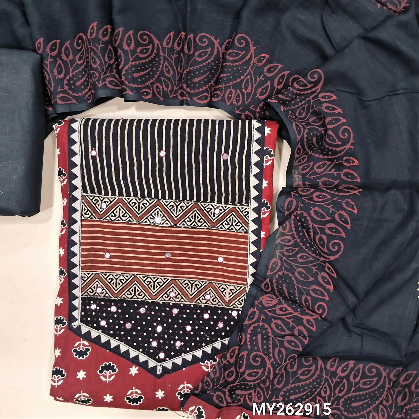 Maroon printed soft cotton unstitched salwar material, ajrak yoke patch with faux mirror work(lining optional)black cotton bottom,hand block printed mul cotton dupatta. MY262915