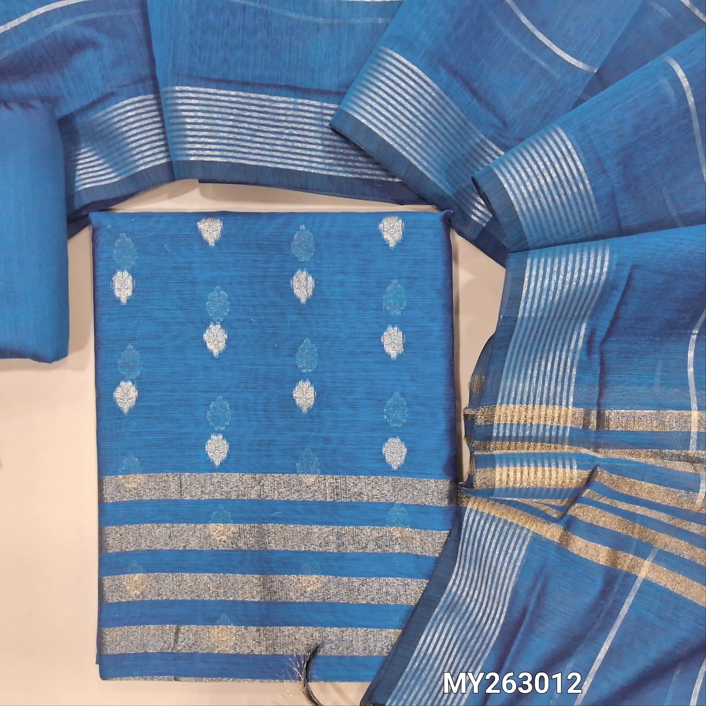 Turquoise blue soft benarasi silk cotton unstitched salwar material(light weight,lining needed)  zari buttas allover, gold tissue on daman, matching silk cotton bottom, vertical zari lines & soft silk cotton dupatta with tassels. MY263012
