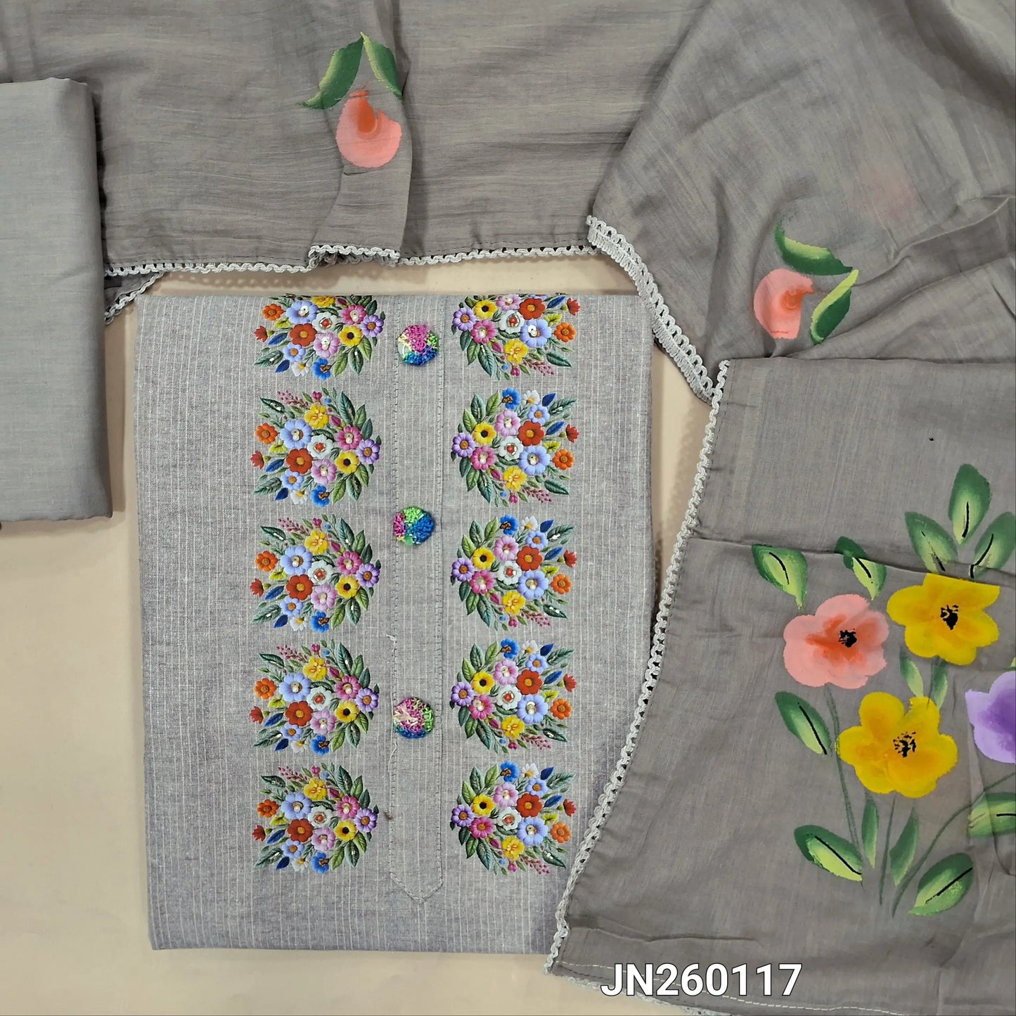 Beige spun cotton unstitched salwar material,floral printed, bead work and thread embroidery buttons on yoke, rich daman,(lining optional)cotton bottom,brush paint work on mul cotton dupatta. JN260117