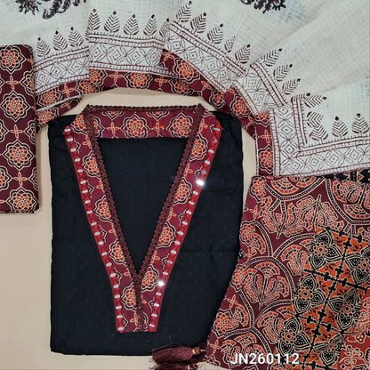 Black premium dobby cotton unstitched salwar material,collar neck with ajrak &real mirror work on yoke, self woven design all over(lining needed) deep wine block printed cotton bottom, block printed kota dupatta with applique work on pallu. JN260112