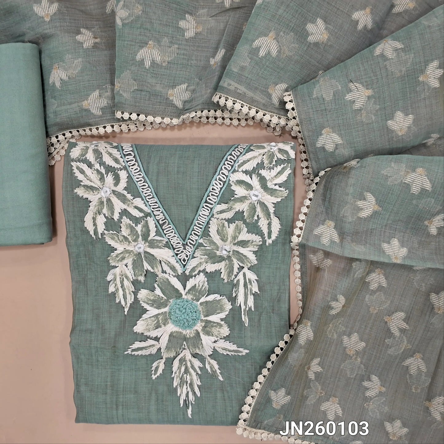 Designer grey shade pure mul chanderi unstitched salwar material,hand embroidery,brush paint,french knot & real mirror work on yoke, embroidery detailing( lining needed)spun cotton bottom, jamdani woven & mul chanderi dupatta with lace tapping. JN260103