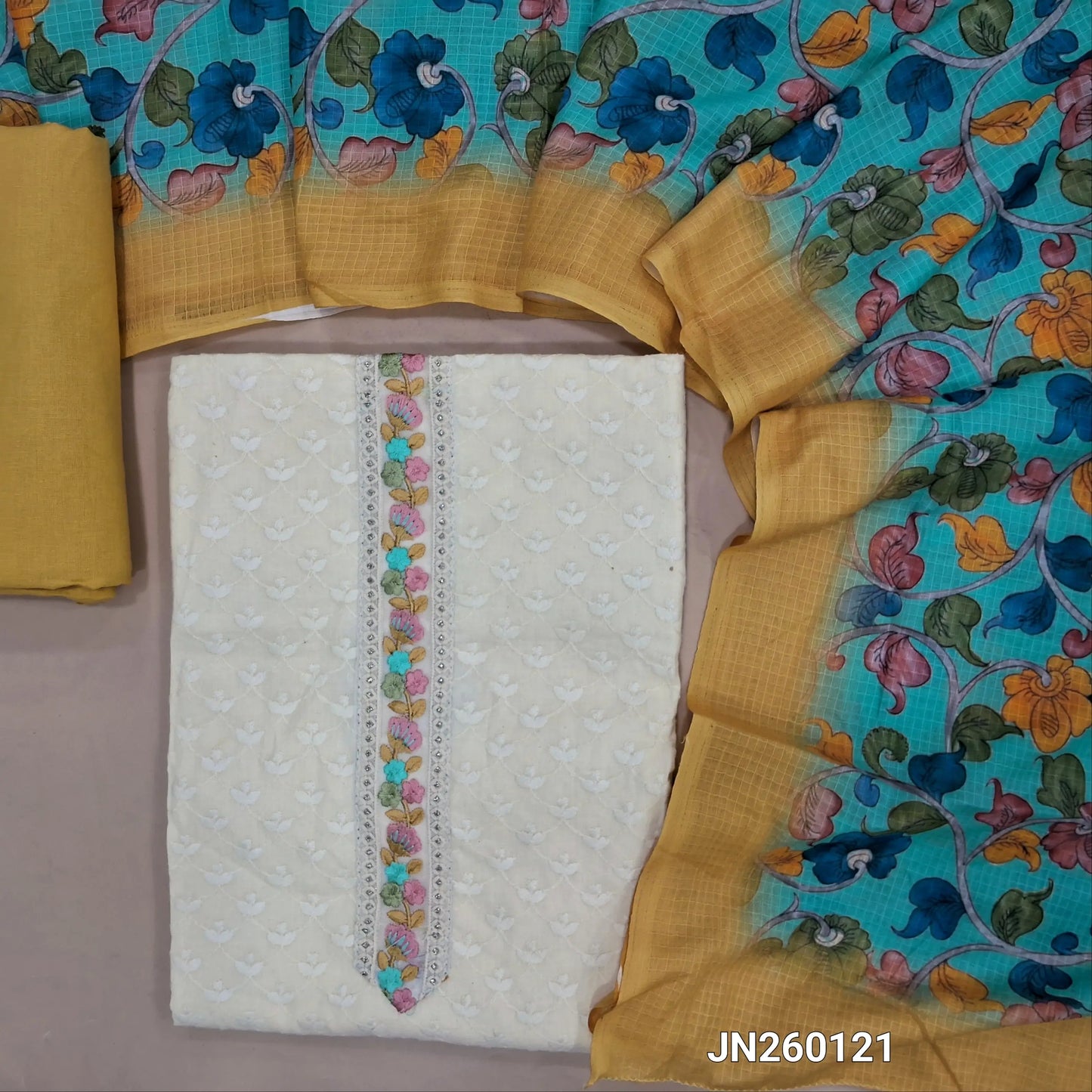 Off white pure  soft cotton unstitched salwar material,embroidered yoke, self embroidery work all over,(lining needed)pastel yellow cotton bottom,floral printed mul cotton dupatta. JN260121