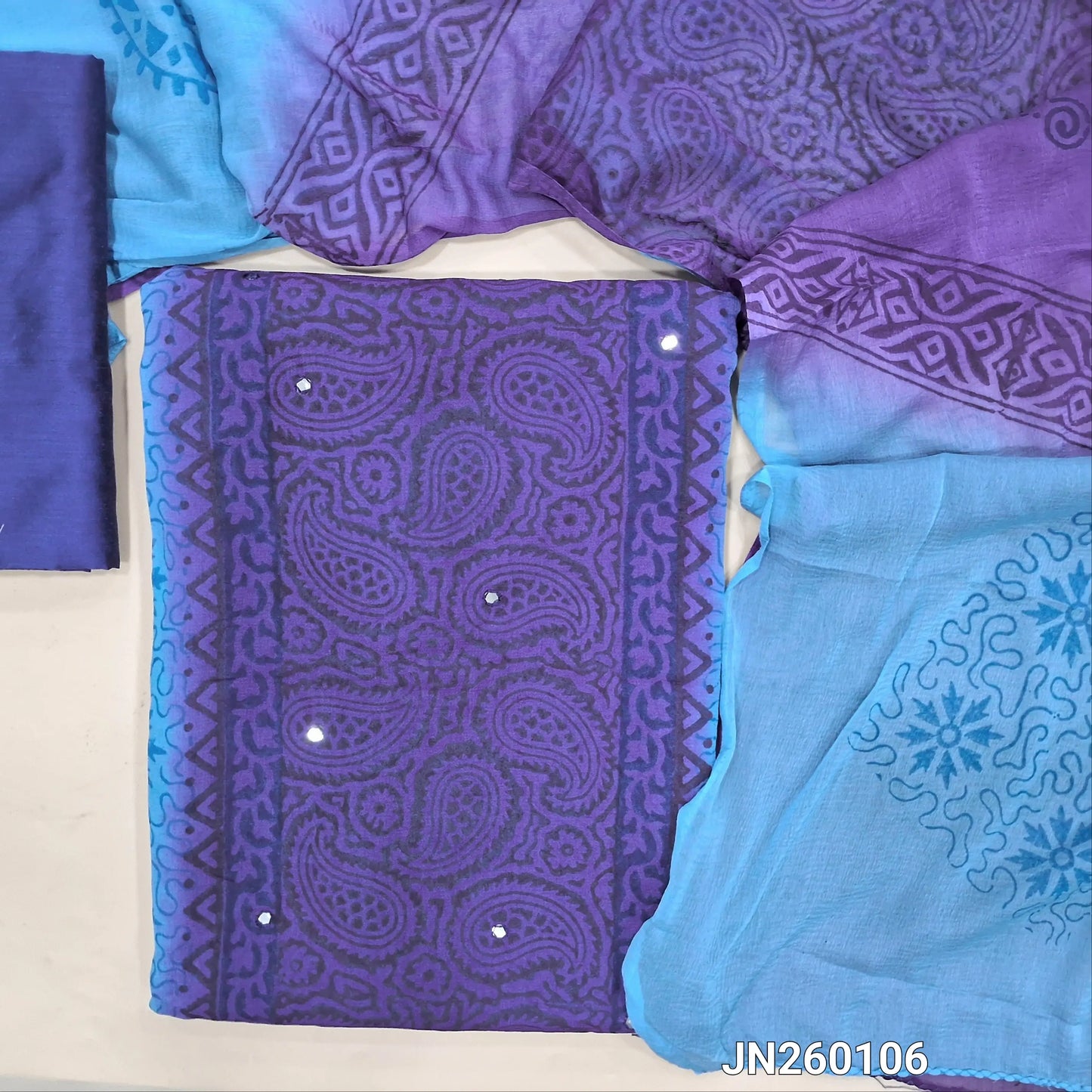 Dark blue & light blue block printed semi georgette unstitched salwar material,(lining needed)panel design, faux mirror work on front,dark blue silk cotton bottom, block printed dual shaded fancy chiffon dupatta.(TAPING NEEDED) JN260106
