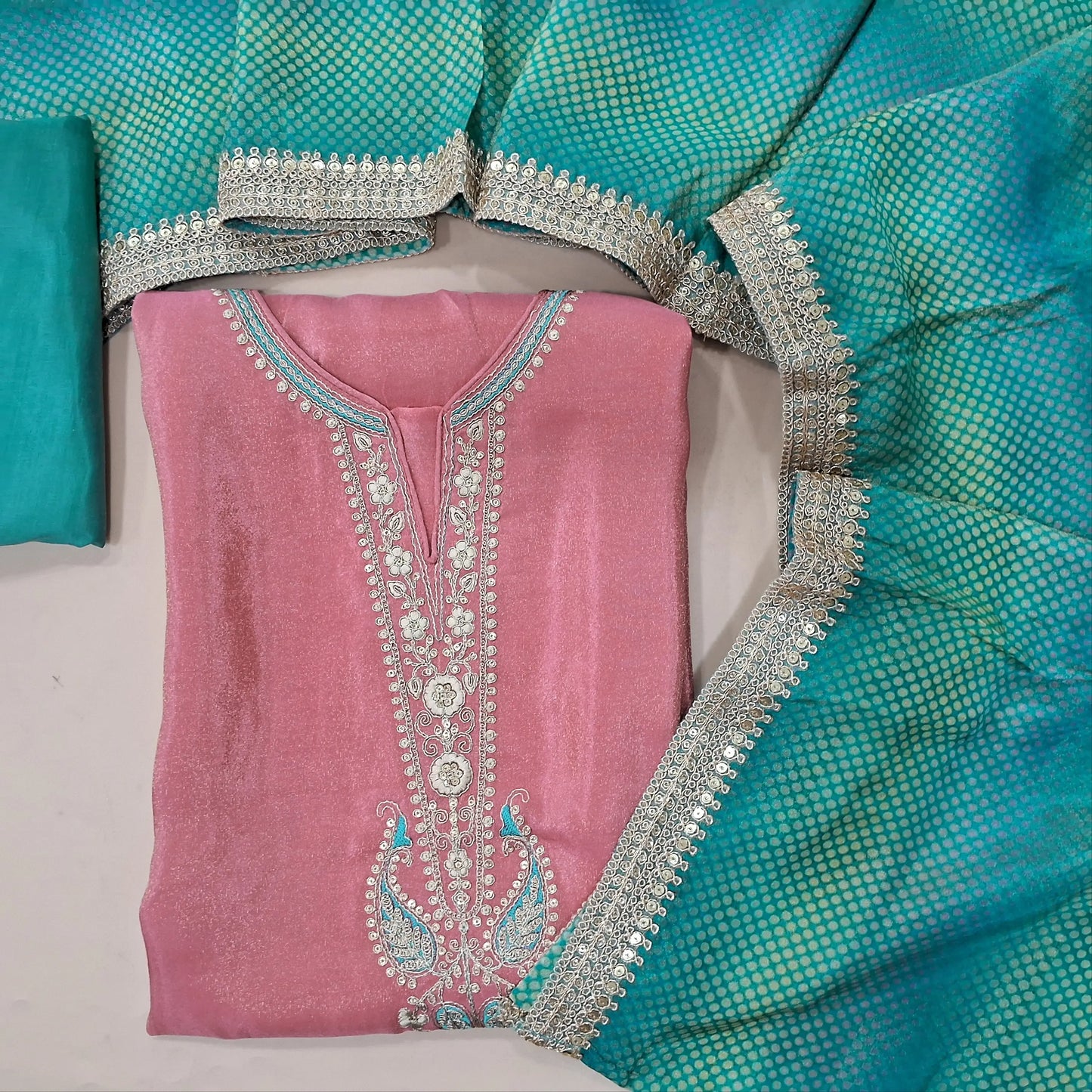 Pink tissue silk unstitched salwar material, zari and thread weaving on yoke (Lining Needed, Silky) Matching bottom, Tissue silk dupatta with borders. MY263122