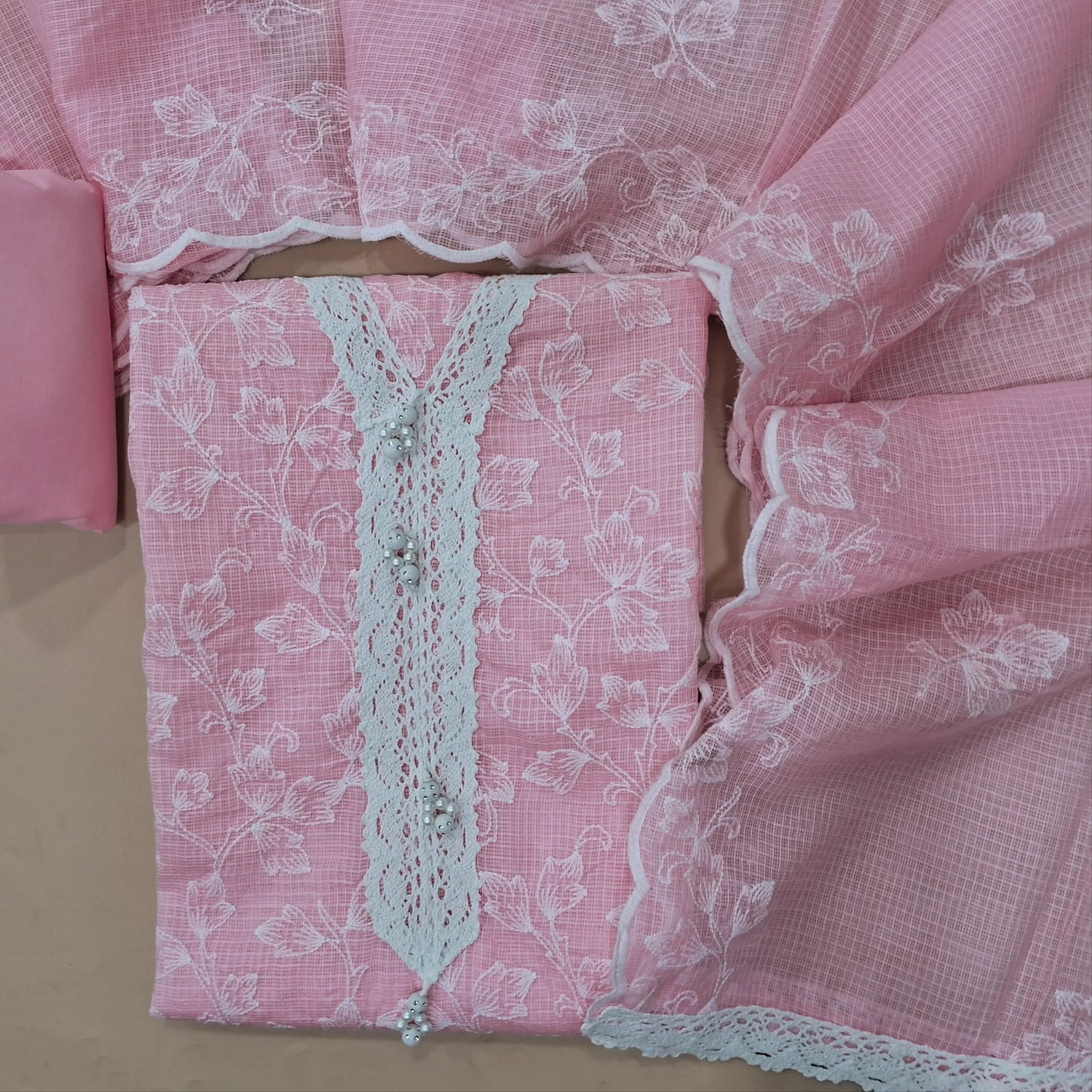 Pastel pink premium kota unstitched salwar material, embroidered all over (Lining Needed) matching cotton bottom, embroidered premium kota dupatta. MY263124