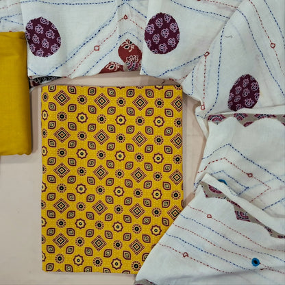 Mehandhi yellow ajrak hand block printed pure cotton unstitched salwar material(lining optional) matching cotton bottom, designer hand made with real mirror, kantha stitch & applique work dupatta with ajrak borders on tassles. MY263103