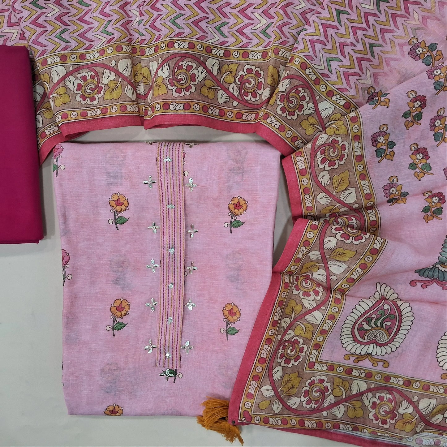 Pastel pink chanderi silk cotton unstitched salwar material,sequins work on yoke,printed on front,(lining needed)pink bottom,digital printed chanderi silk cotton dupatta. MY263102