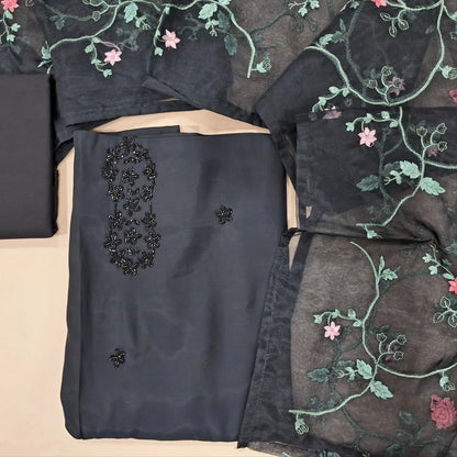 Black soft silk cotton unstitched salwar material,cutbead work on front,(soft, lining needed)cotton bottom,embroidered fancy organza dupatta. MY263116