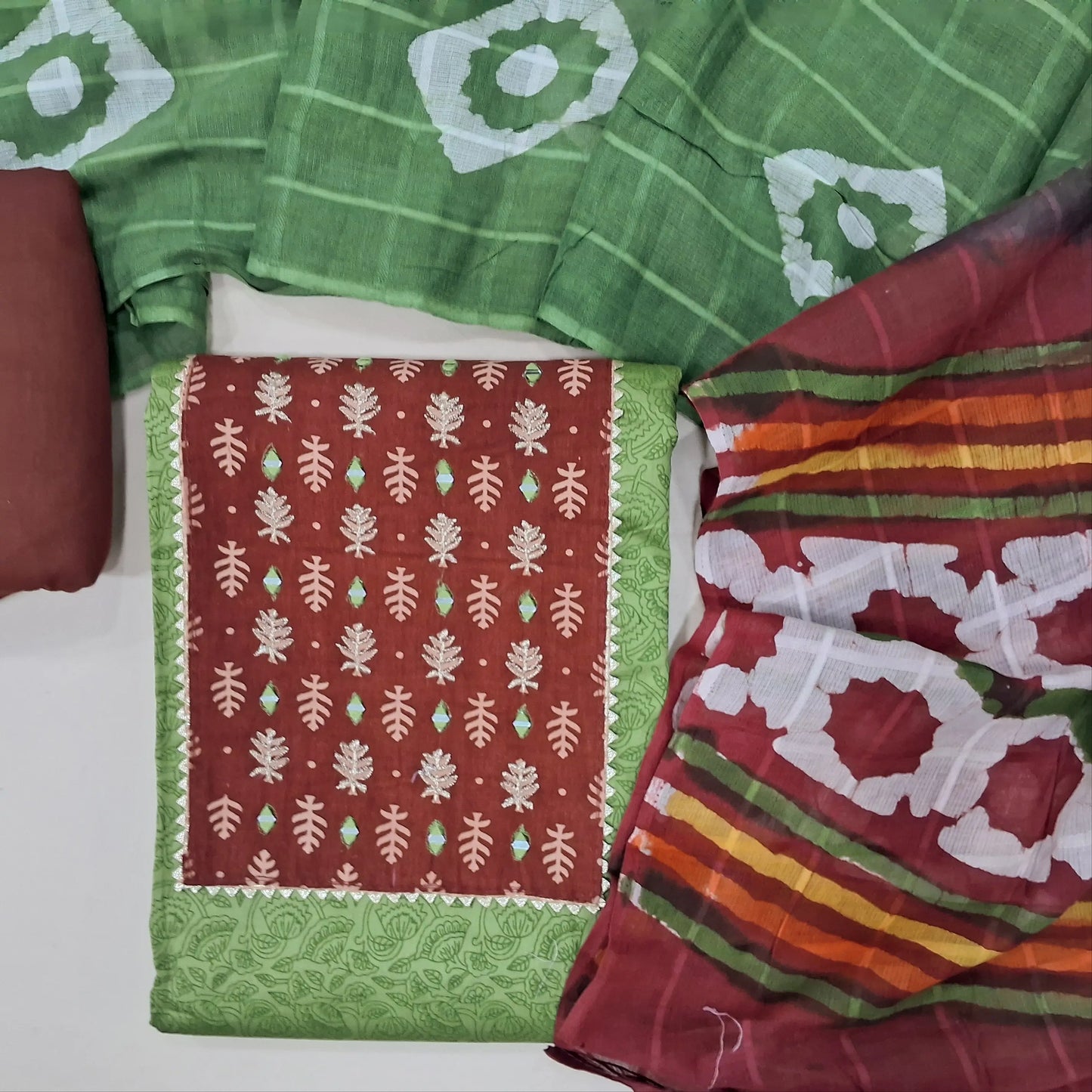 Leafy green digital printed cotton unstitched salwar material, contrast yoke with mirror work (Lining Optional) Contrast cotton bottom, multicolor soft cotton dupatta. MY263120
