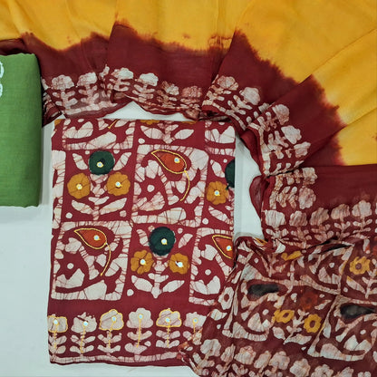 Reddish maroon wax batik dyed soft cotton unstitched salwar material. thread and faux mirror work(Lining Needed) contrast batik dyed bottom, batik pure chiffon short width dupatta. MY263121