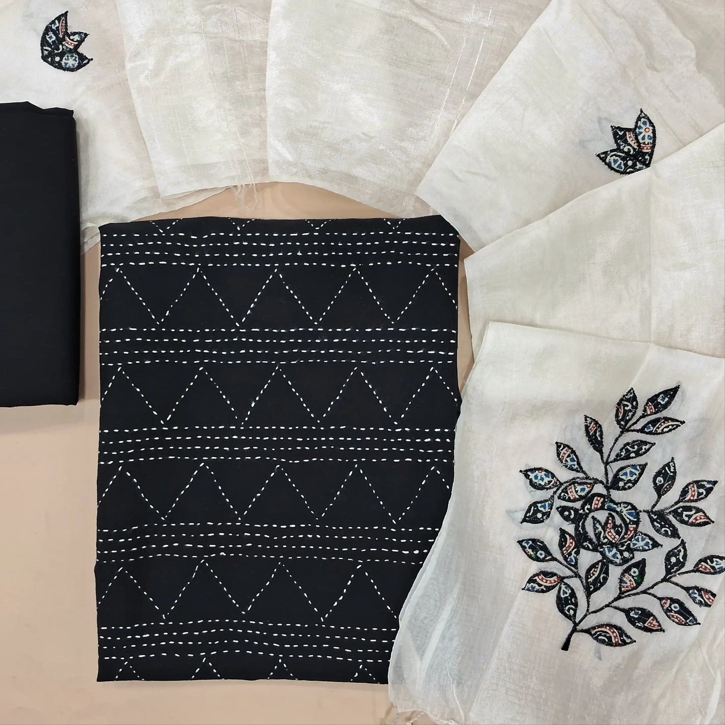 Black pure cotton unstitched salwar material, kantha stitch on front,(lining needed)cotton bottom, applique work on fancy orangza dupatta. MY263108